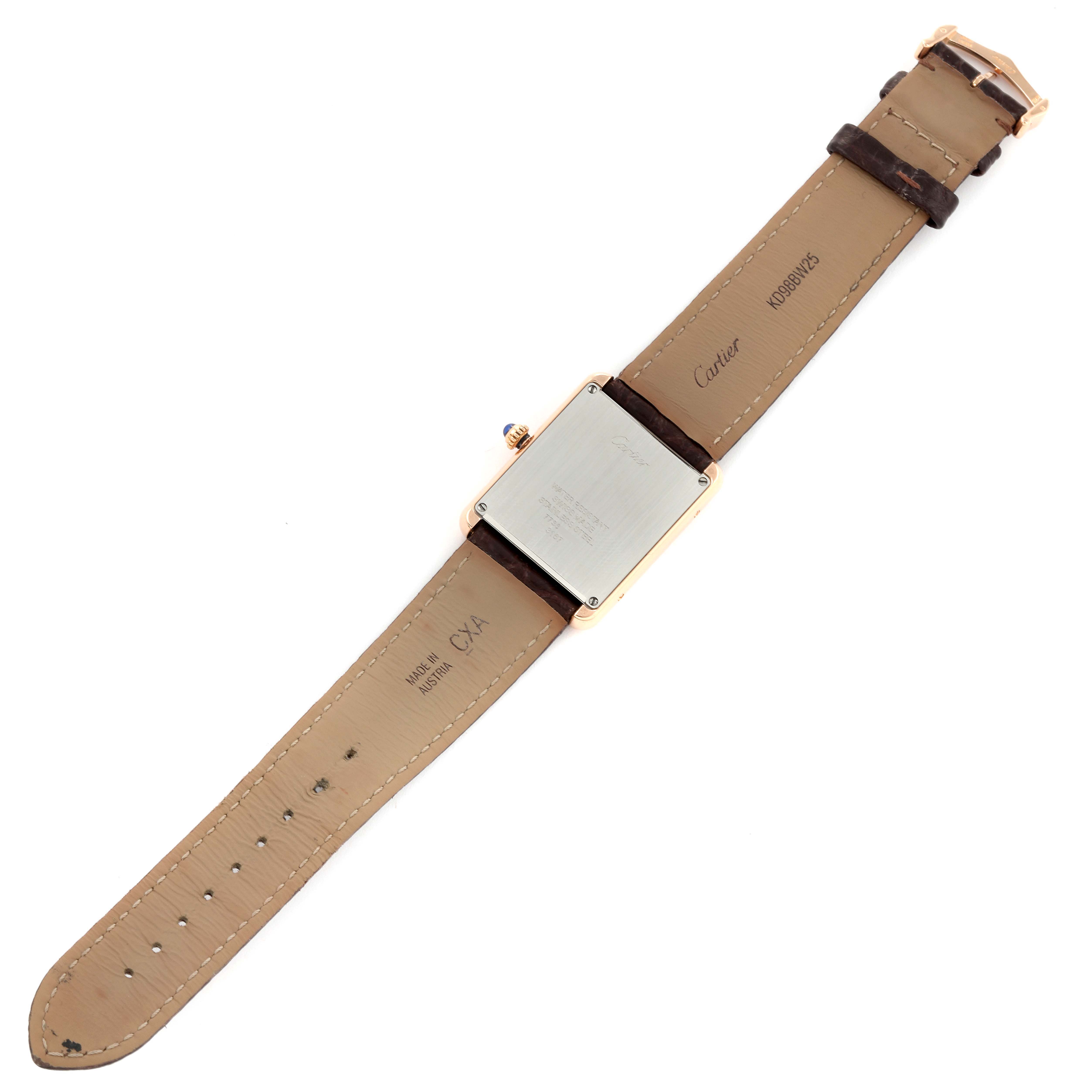 This image shows the back view of the Cartier Tank Solo W5200025 Men
s Steel and Gold (two tone) Silver Dial W5200025 Men
s Steel and Gold (two tone) Silver Dial watch, including the case back and leather strap.