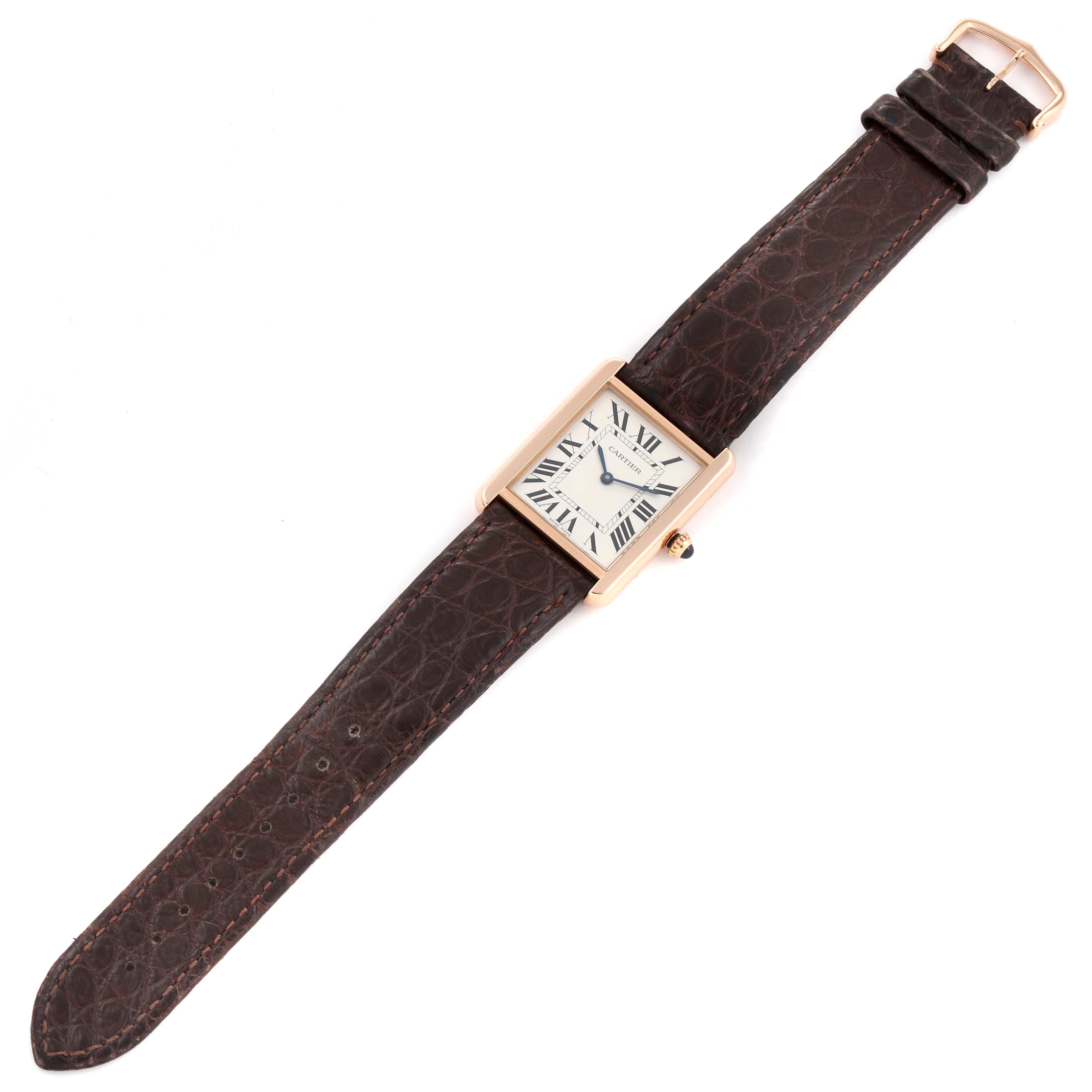 The Cartier Tank Solo W5200025 Men
s Steel and Gold (two tone) Silver Dial W5200025 Men
s Steel and Gold (two tone) Silver Dial watch is shown at an angled top-down view, displaying the full watch with its rectangular face and brown leather strap.