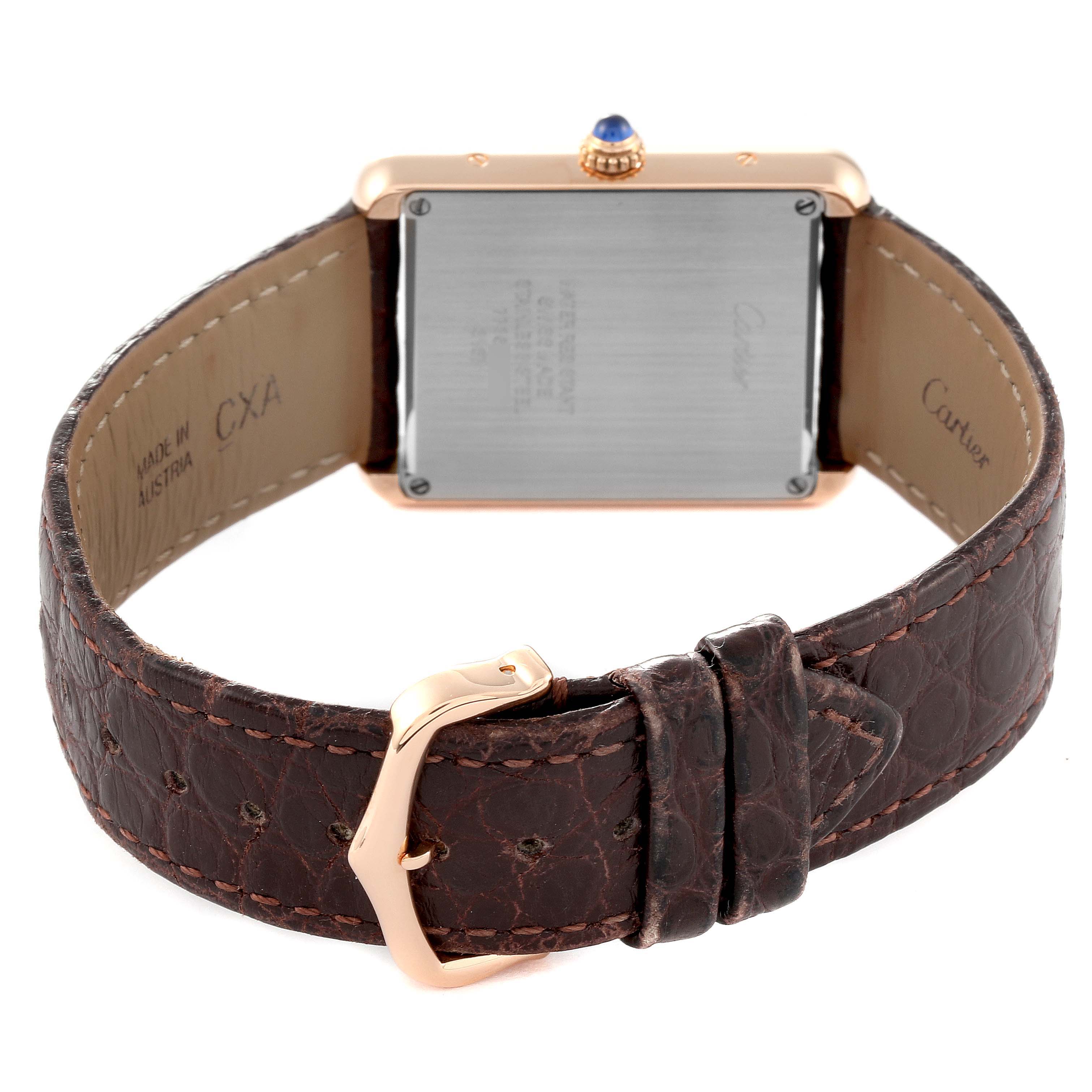 The Cartier Tank Solo W5200025 Men
s Steel and Gold (two tone) Silver Dial W5200025 Men
s Steel and Gold (two tone) Silver Dial watch is shown from the back, highlighting its strap, buckle, case back, and crown.