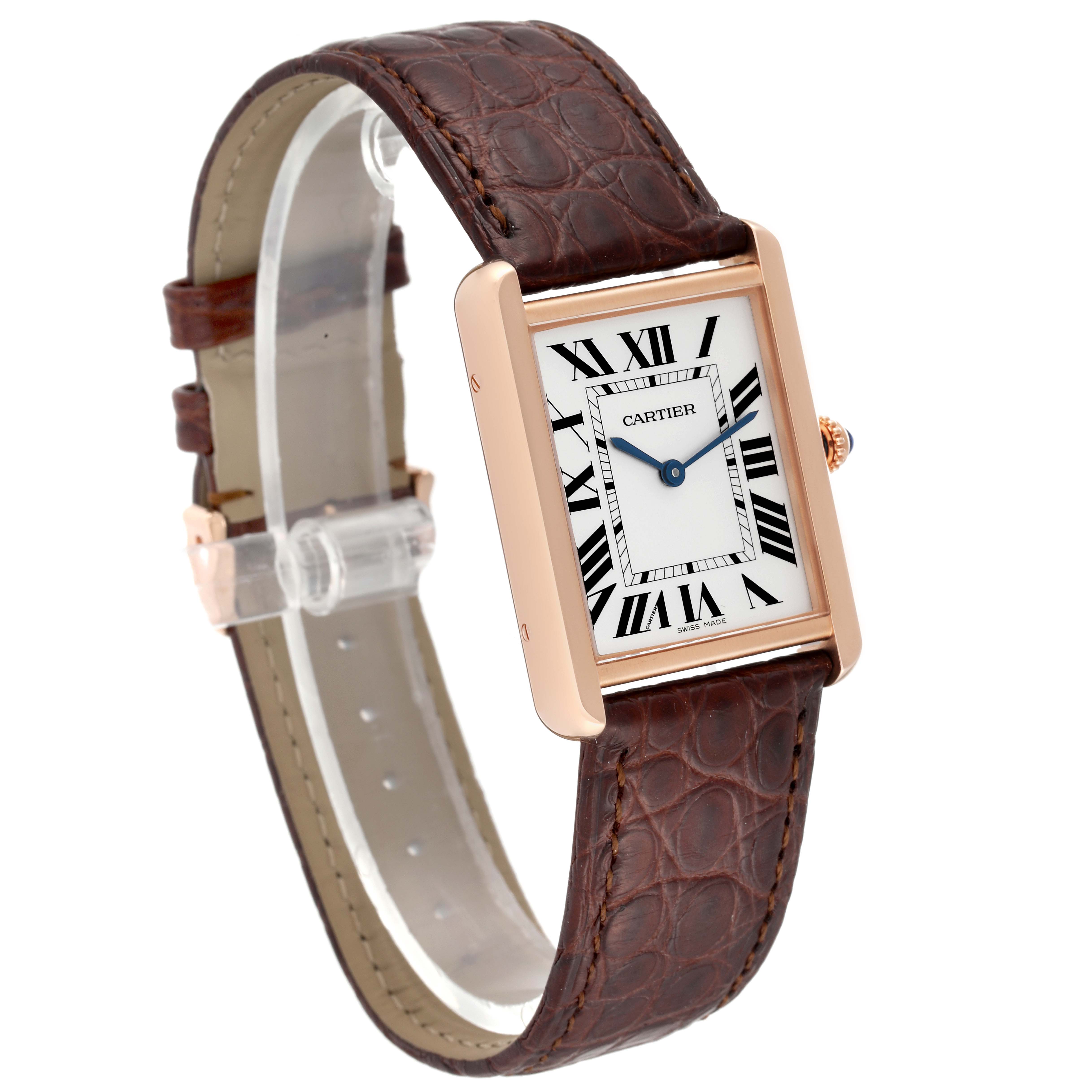 The Cartier Tank Solo W5200025 Men
s Steel and Gold (two tone) Silver Dial W5200025 Men
s Steel and Gold (two tone) Silver Dial watch is shown at an angled side view, displaying its rectangular face and brown leather strap.