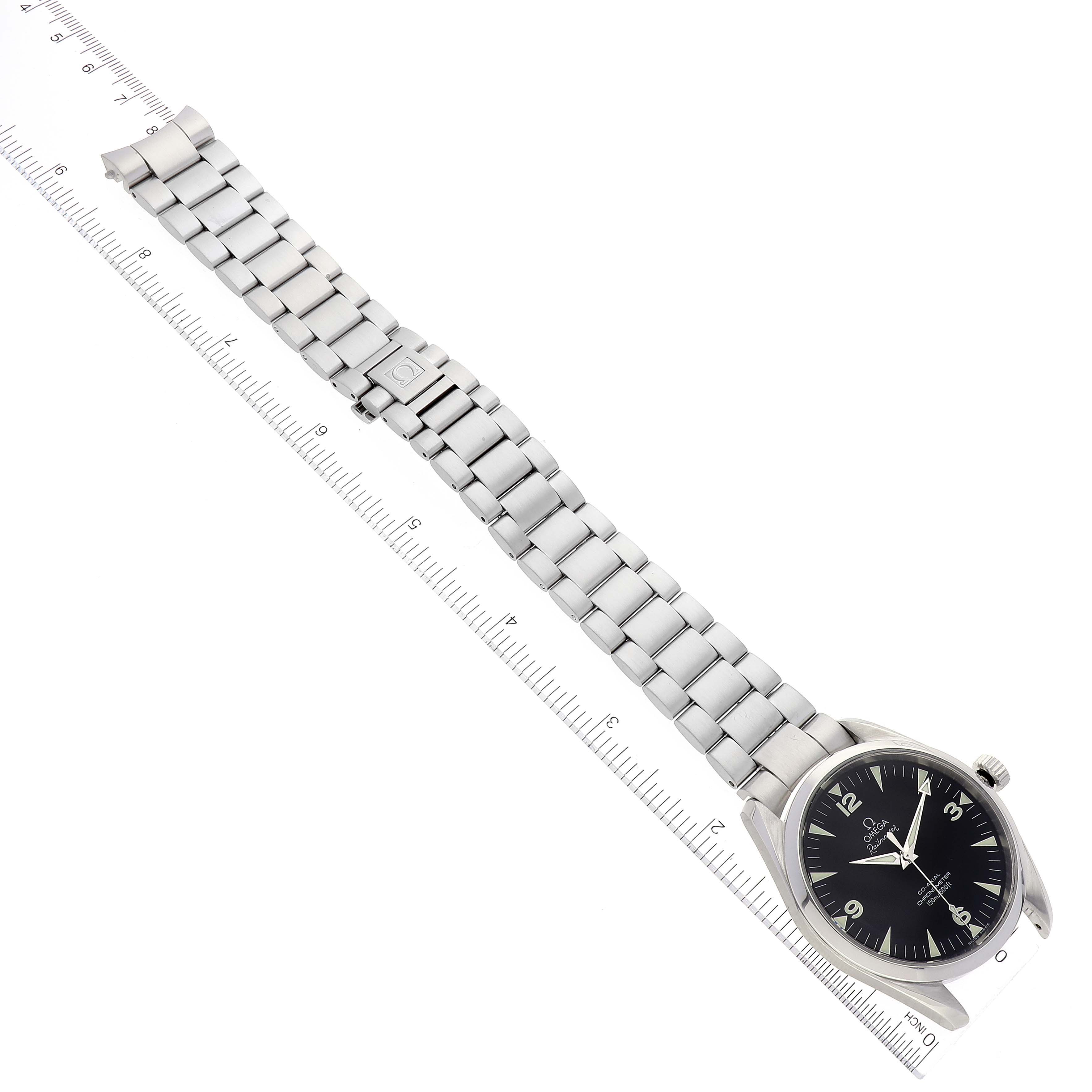 The Aqua Terra model by Omega is displayed from a top-down angle, showing the full watch face and metallic bracelet with clasp.