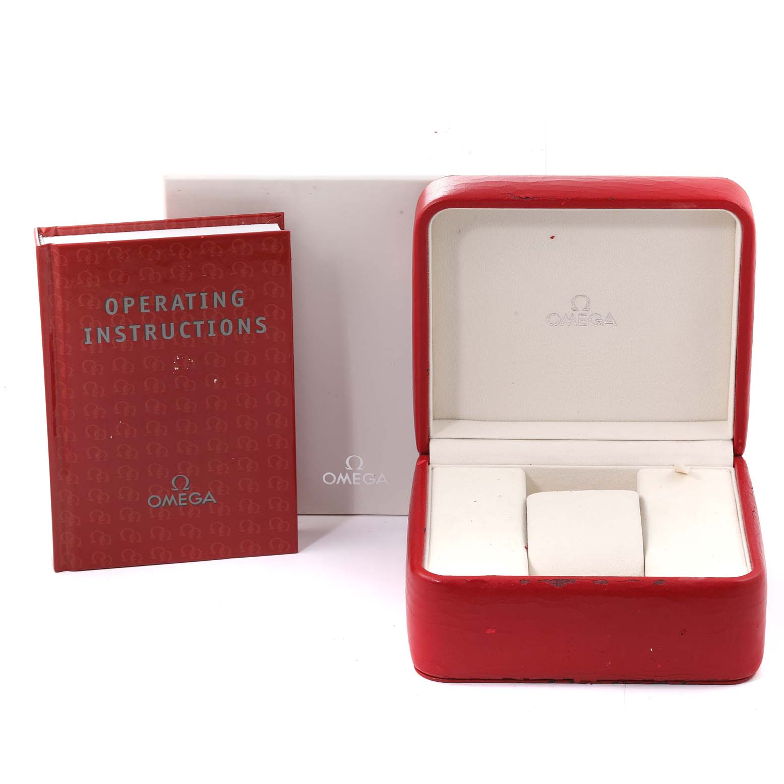 The image shows the operating instructions, box, and cushion of the Omega Aqua Terra 2502.52.00 Men's Stainless Steel Black Dial 2502.52.00 Men's Stainless Steel Black Dial model watch.