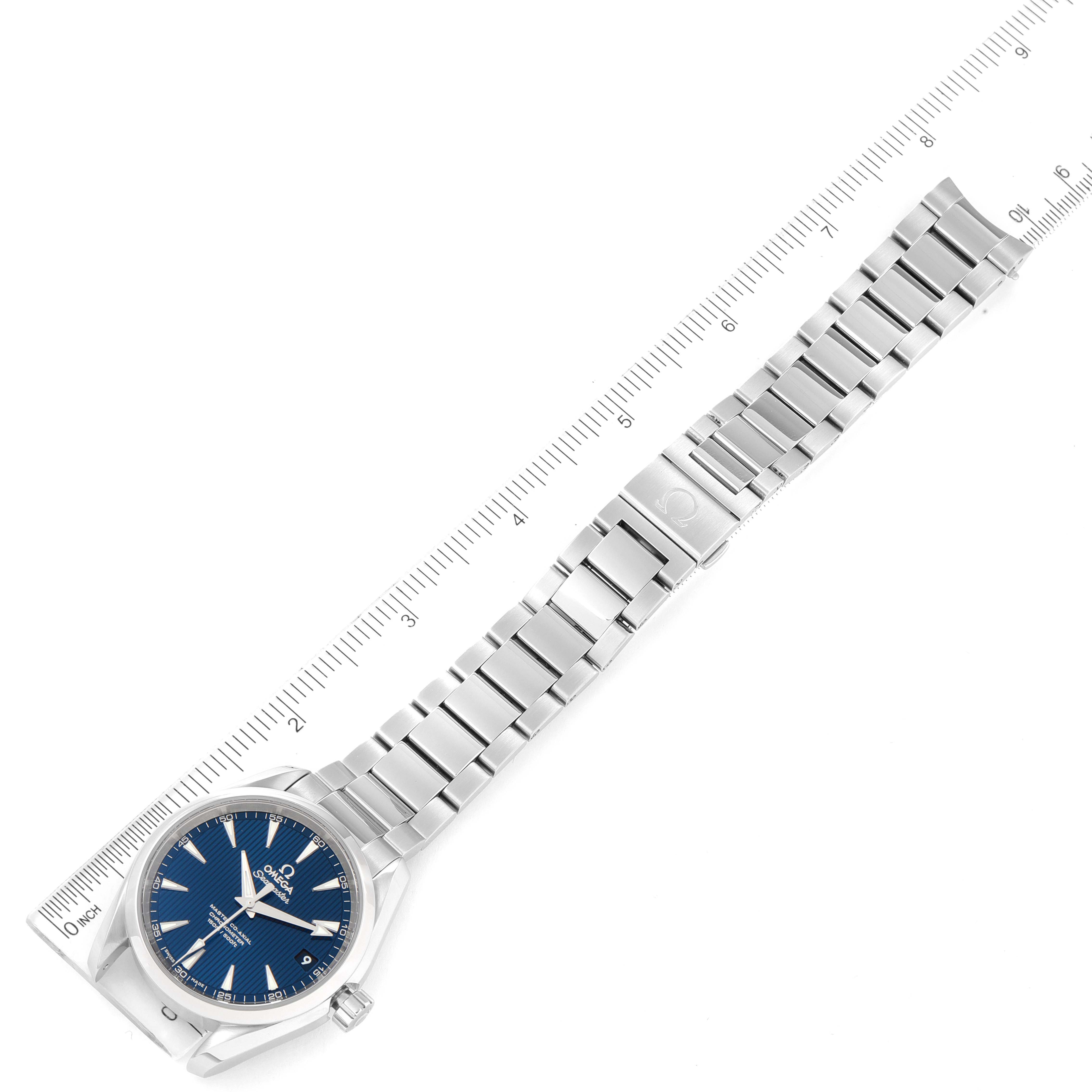 The Omega Aqua Terra 231.10.39.21.03.002 Men's Stainless Steel Blue Dial 231.10.39.21.03.002 Men's Stainless Steel Blue Dial watch is shown flat with its face and stainless steel bracelet visible, alongside a ruler for measurement.