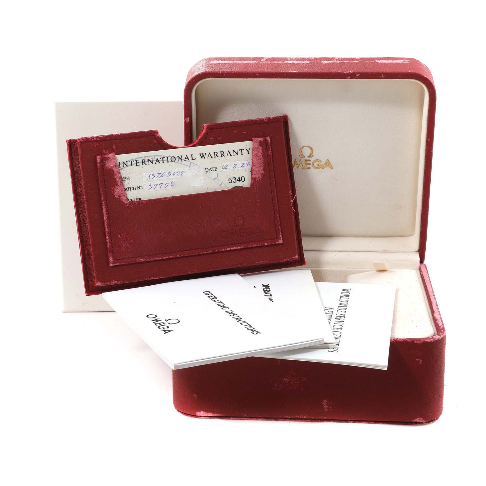 The image shows the open box, warranty card, and instruction booklets for an Omega Speedmaster 3520.50.00 Men
s Stainless Steel Black Dial 3520.50.00 Men
s Stainless Steel Black Dial watch.