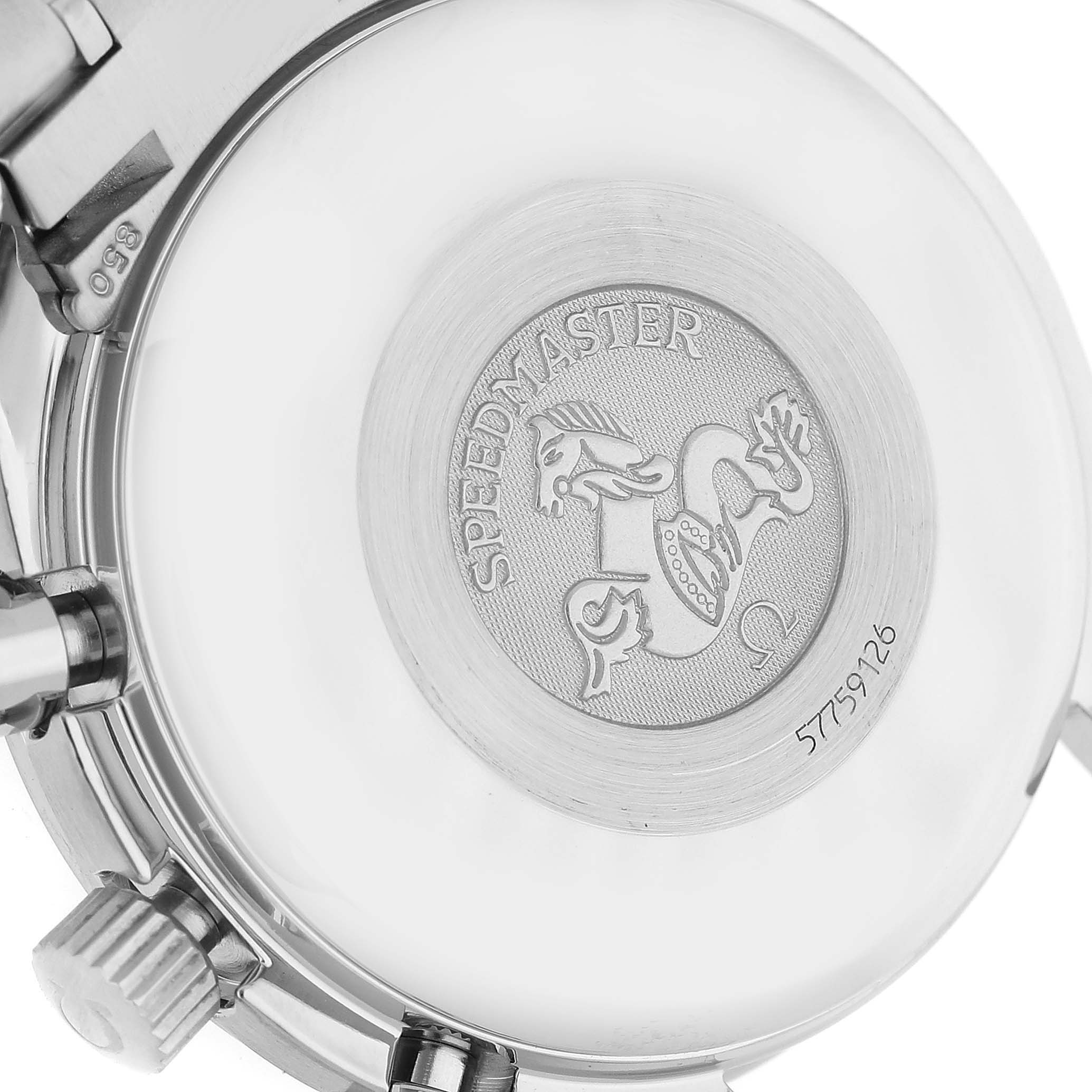 The image shows the caseback of an Omega Speedmaster 3520.50.00 Men
s Stainless Steel Black Dial 3520.50.00 Men
s Stainless Steel Black Dial watch, highlighting its engraved emblem and serial number.