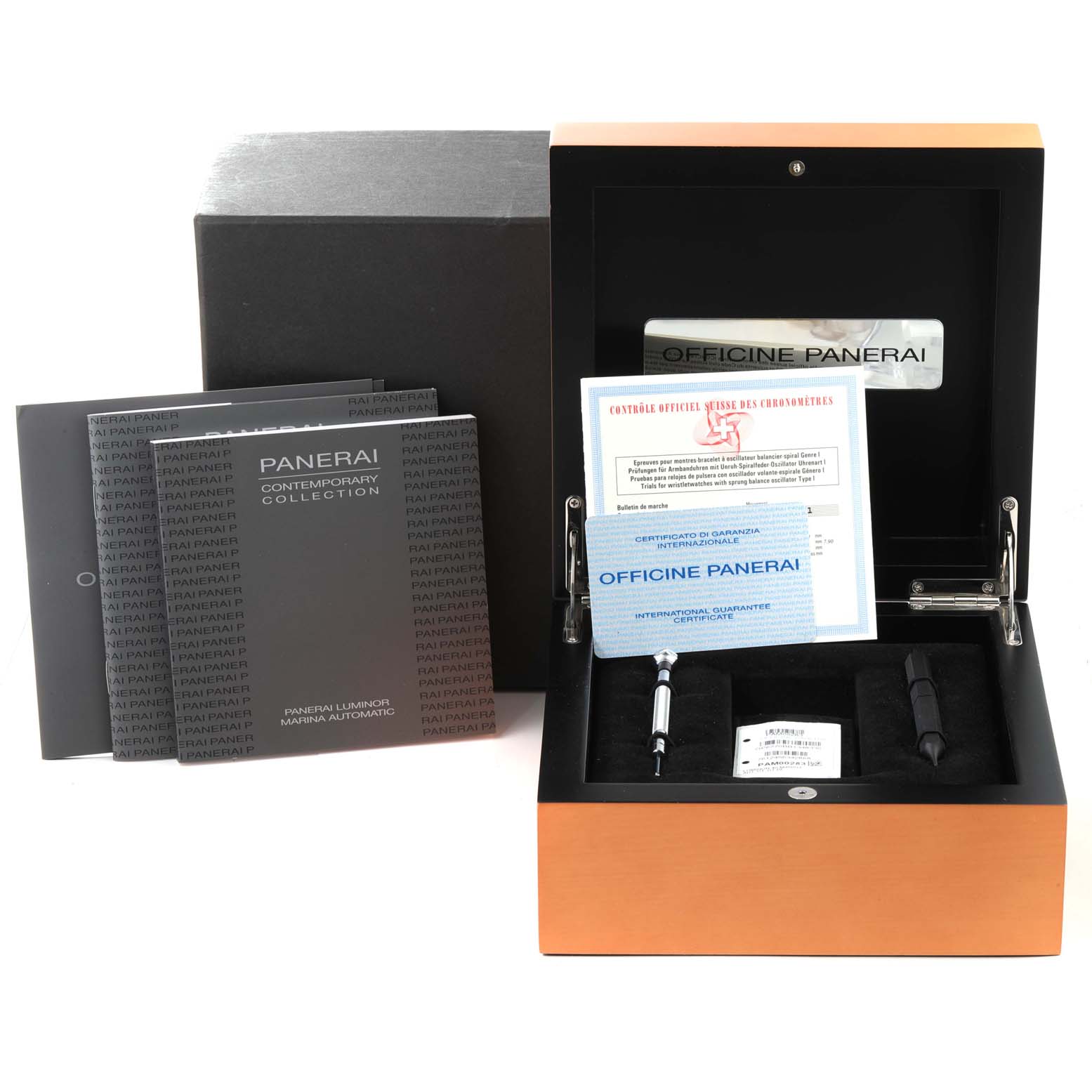 The image shows the packaging and accessories for a Panerai Luminor PAM00283 Men's Titanium Blue Dial PAM00283 Men's Titanium Blue Dial, including the box, manuals, certifications, and tools.