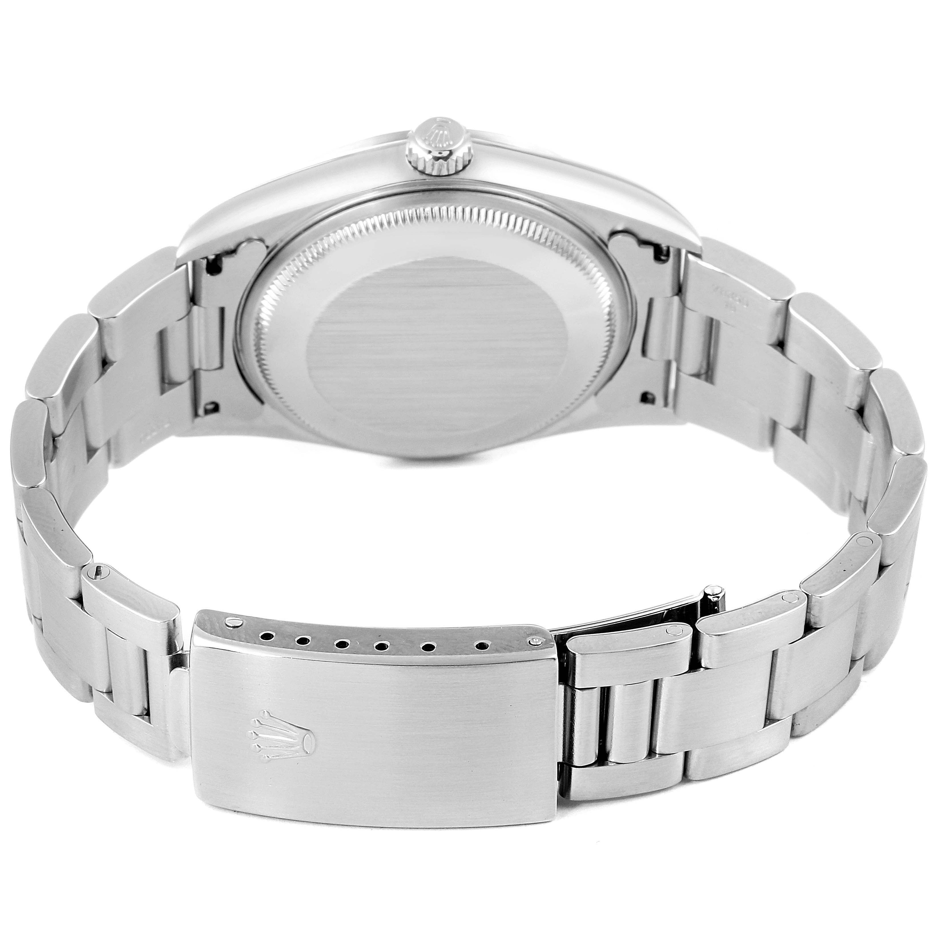 The image shows the back view of a Rolex Air-King 14000M Men's Stainless Steel Blue Dial 14000M Men's Stainless Steel Blue Dial watch, featuring the case back, crown, and bracelet clasp.