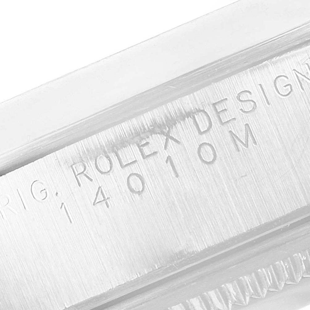 This image shows an angled close-up of the engraved model number on the side of a Rolex Air-King 14000 Men's Stainless Steel White Dial 14000 Men's Stainless Steel White Dial watch case.
