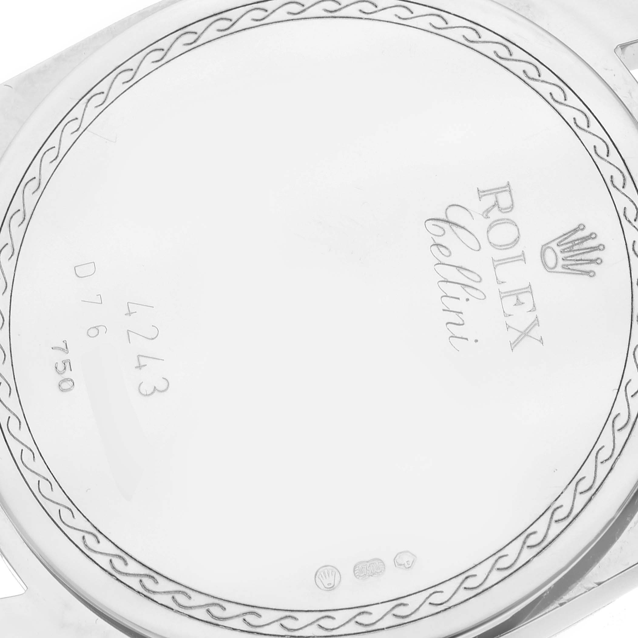The image shows the back case of a Rolex Cellini 4243/9 Men
s White Gold Silver Dial 4243/9 Men
s White Gold Silver Dial watch, featuring the model name and some engraved markings.