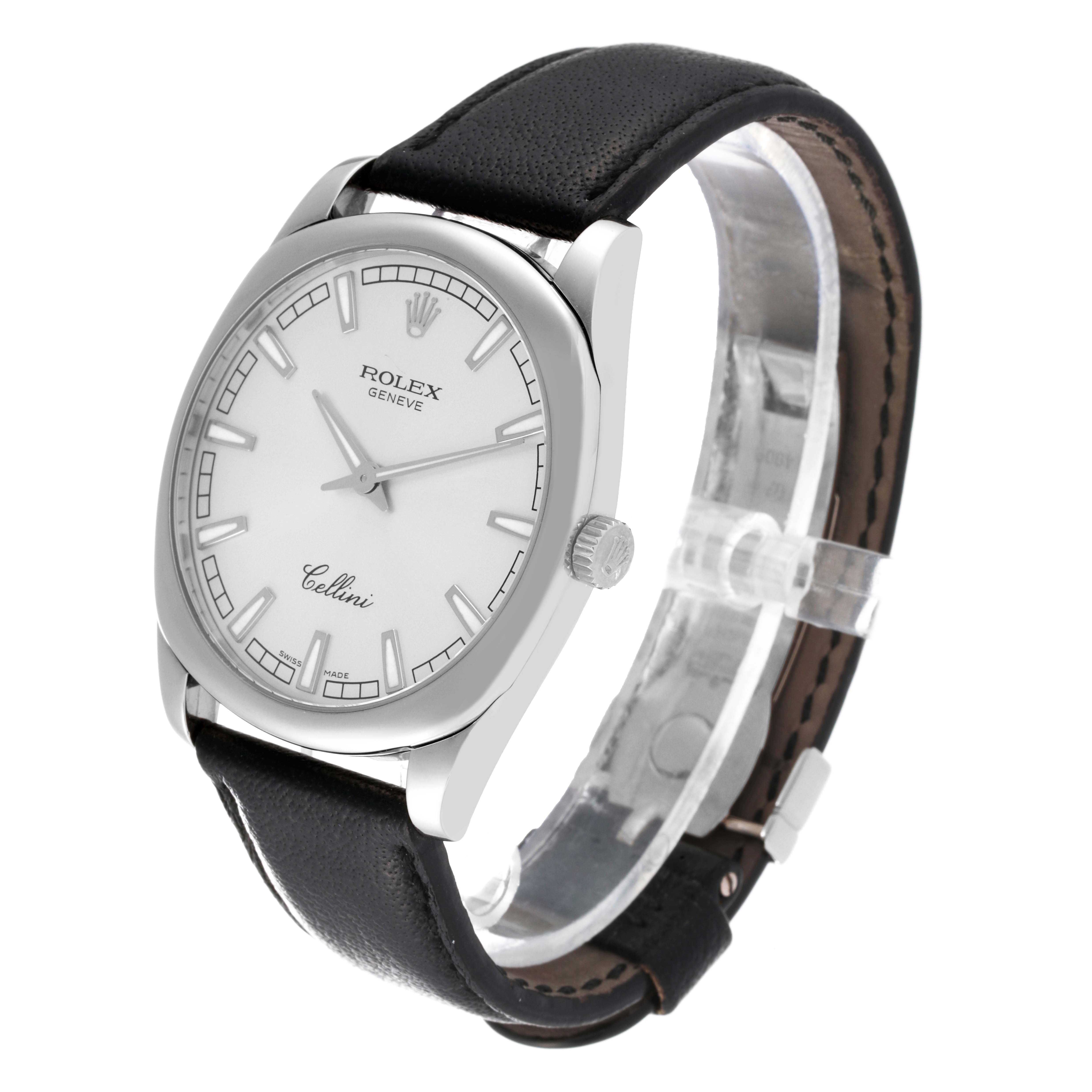 This image shows a Rolex Cellini 4243/9 Men
s White Gold Silver Dial 4243/9 Men
s White Gold Silver Dial watch at an angle displaying its face, bezel, crown, and leather strap.