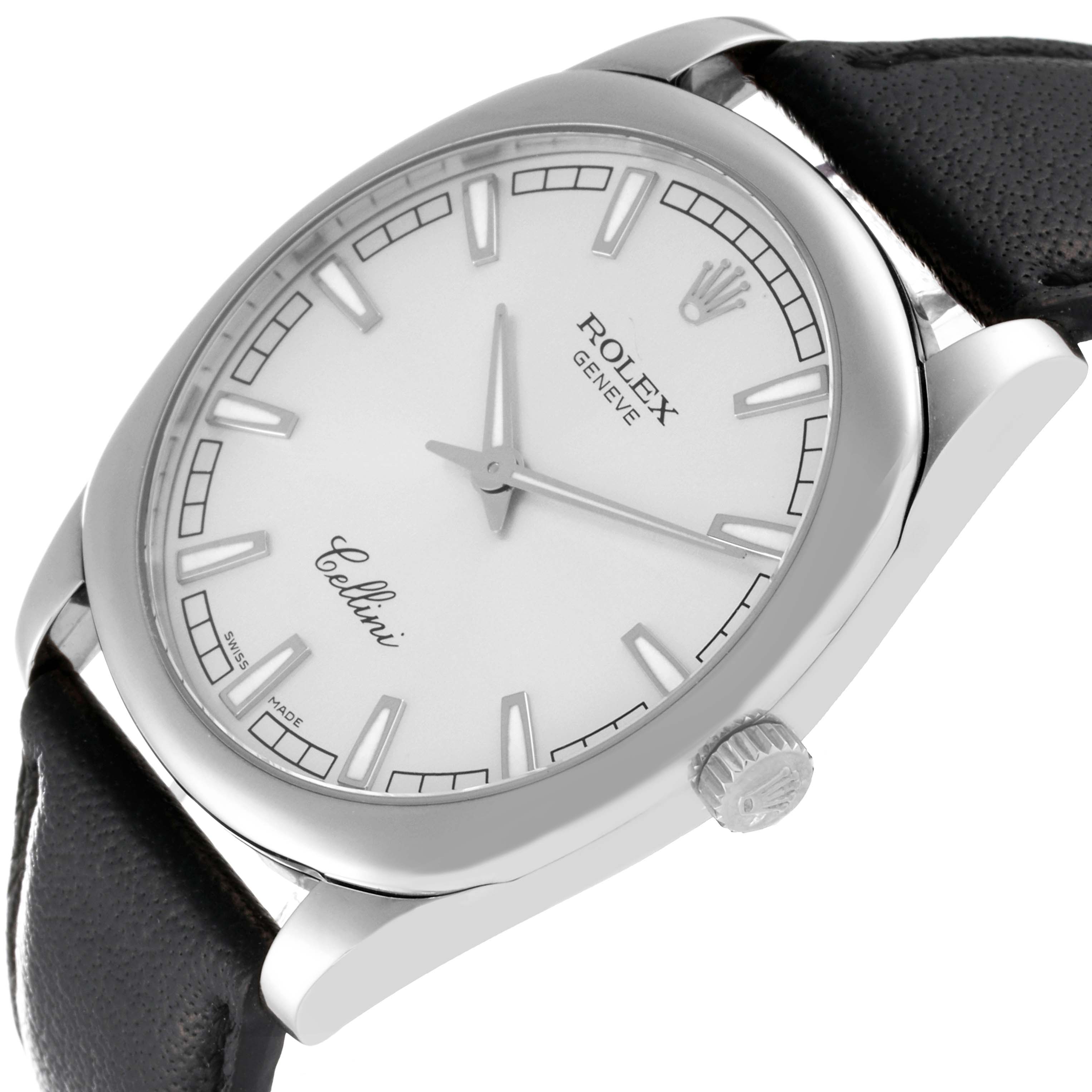 The image shows a Rolex Cellini 4243/9 Men
s White Gold Silver Dial 4243/9 Men
s White Gold Silver Dial watch angled to display its face, bezel, crown, and part of its leather strap.