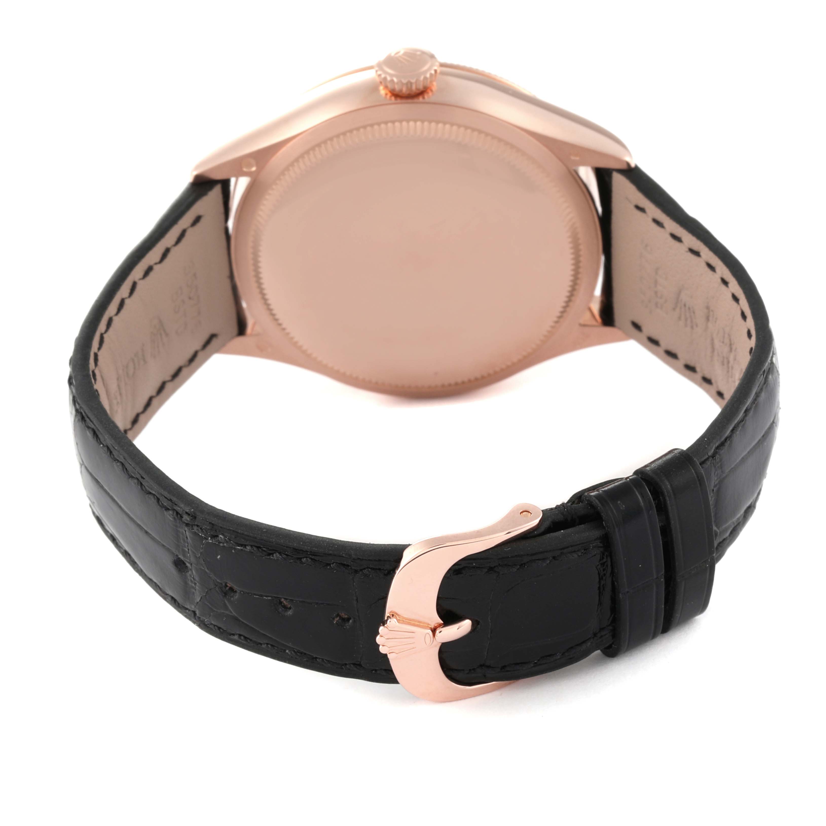 This image shows the rear angle of a Rolex Cellini 50515 Men's Rose Gold Silver Dial 50515 Men's Rose Gold Silver Dial watch, highlighting the case back, crown, and black leather strap with a clasp.