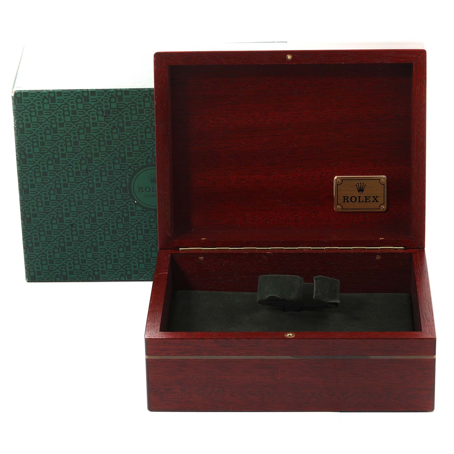 The image shows an open Rolex watch box for the Daytona model, with a closed green outer box beside it.