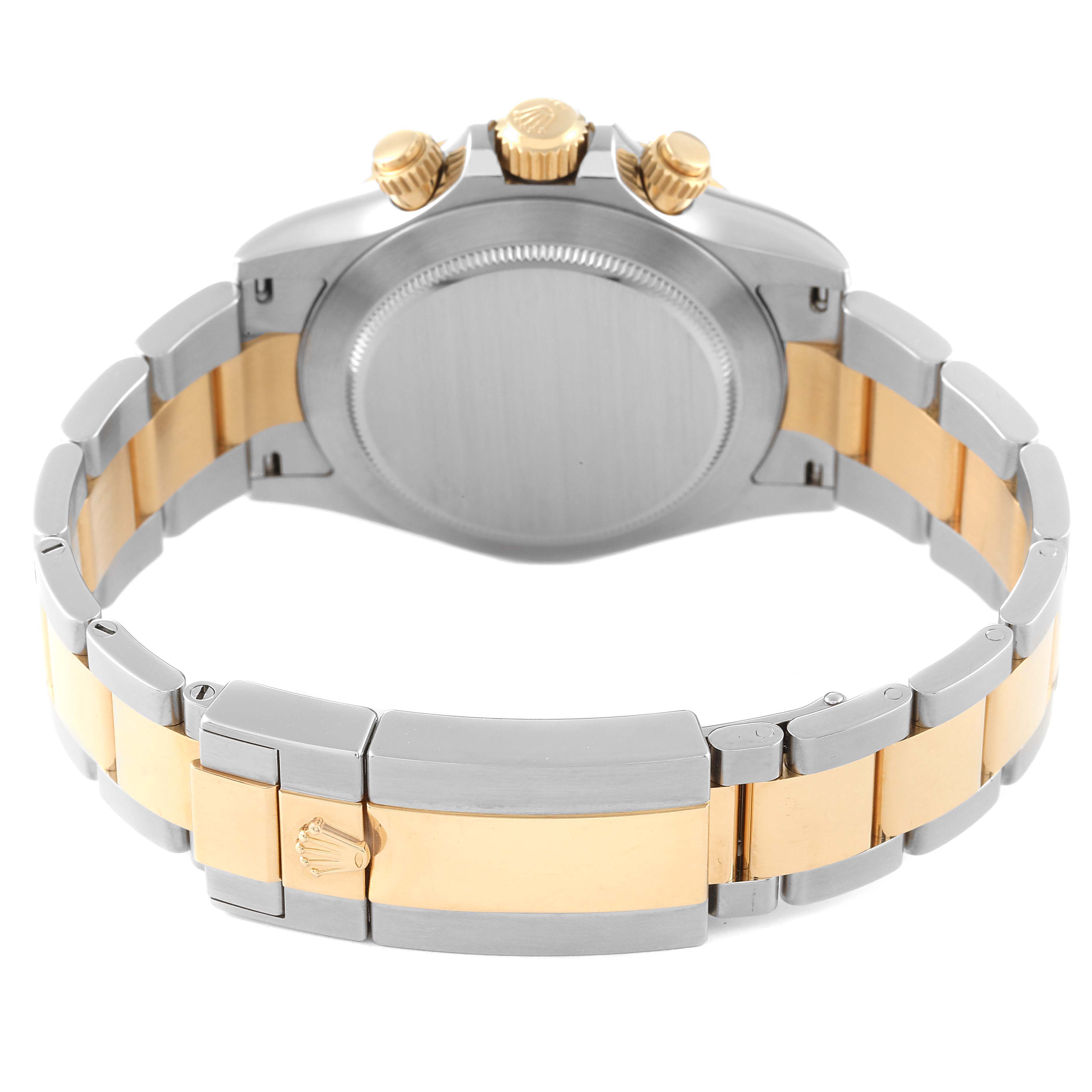 This image shows the back view of a Rolex Daytona 116503 Men's Steel and Gold (two tone) Champagne Dial 116503 Men's Steel and Gold (two tone) Champagne Dial watch, focusing on the clasp, bracelet, and caseback.