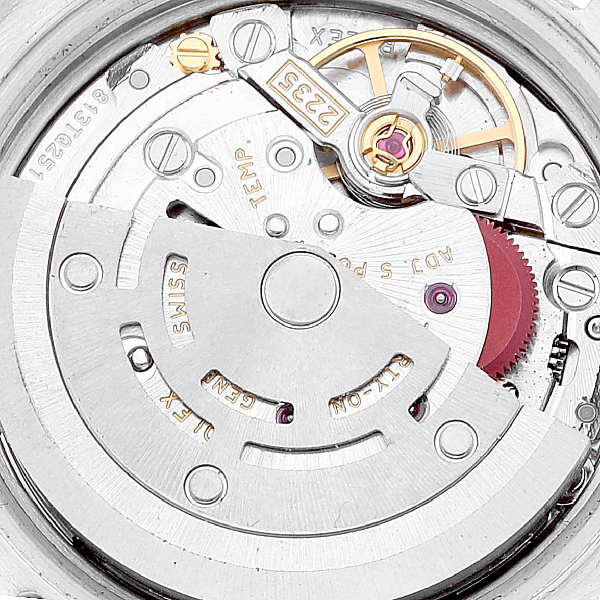 The image shows a close-up view of the movement mechanism of a Rolex Datejust 179383 Women's Steel and Gold (two tone) Champagne Dial 179383 Women's Steel and Gold (two tone) Champagne Dial watch.