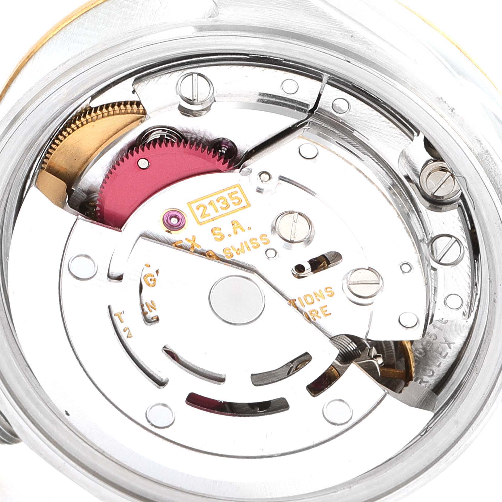 This is a close-up view of the movement of a Rolex Datejust 69173 Men's Steel and Gold (two tone) Champagne Dial 69173 Men's Steel and Gold (two tone) Champagne Dial watch, showcasing the intricate internal mechanisms.