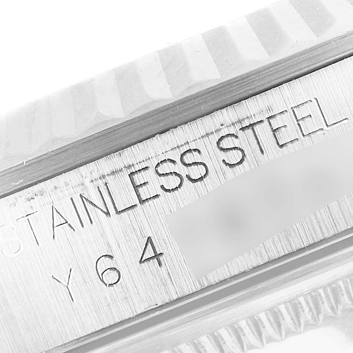 This is a close-up angle showing the engraved "Stainless Steel" marking on the inner bezel of a Rolex Datejust 16234 Men's Stainless Steel Black Dial 16234 Men's Stainless Steel Black Dial watch.