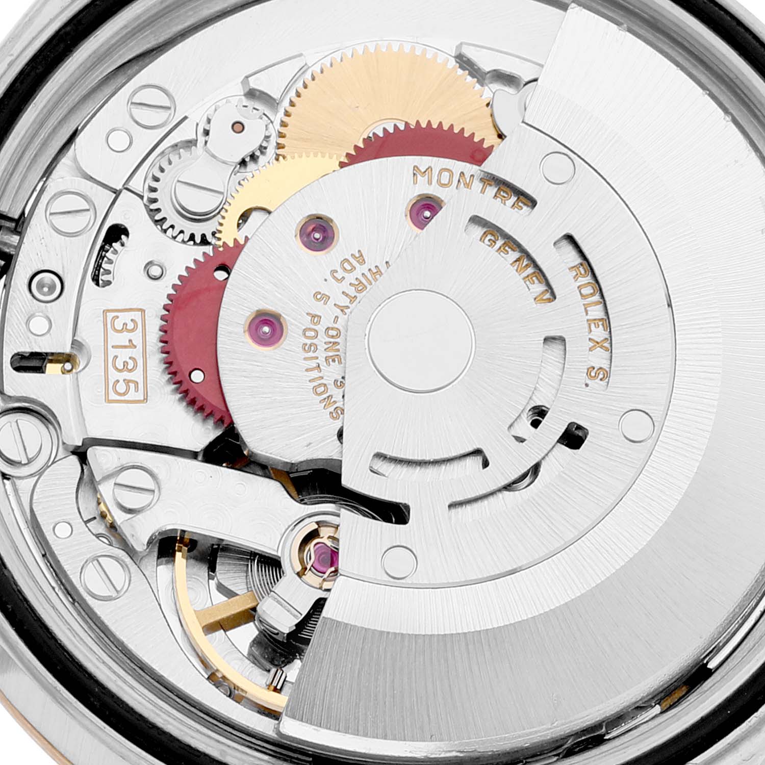 This image shows a close-up view of the Rolex Datejust 16233 Men's Steel and Gold (two tone) Blue Dial 16233 Men's Steel and Gold (two tone) Blue Dial movement mechanism with visible gears and rotor.