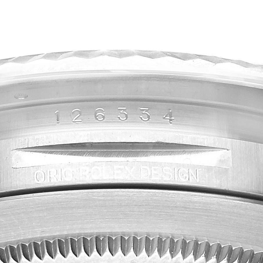 The image shows a close-up angle of the caseback edge and serial number of the Rolex Datejust 41 126334 Men's Stainless Steel Black Dial 126334 Men's Stainless Steel Black Dial model.