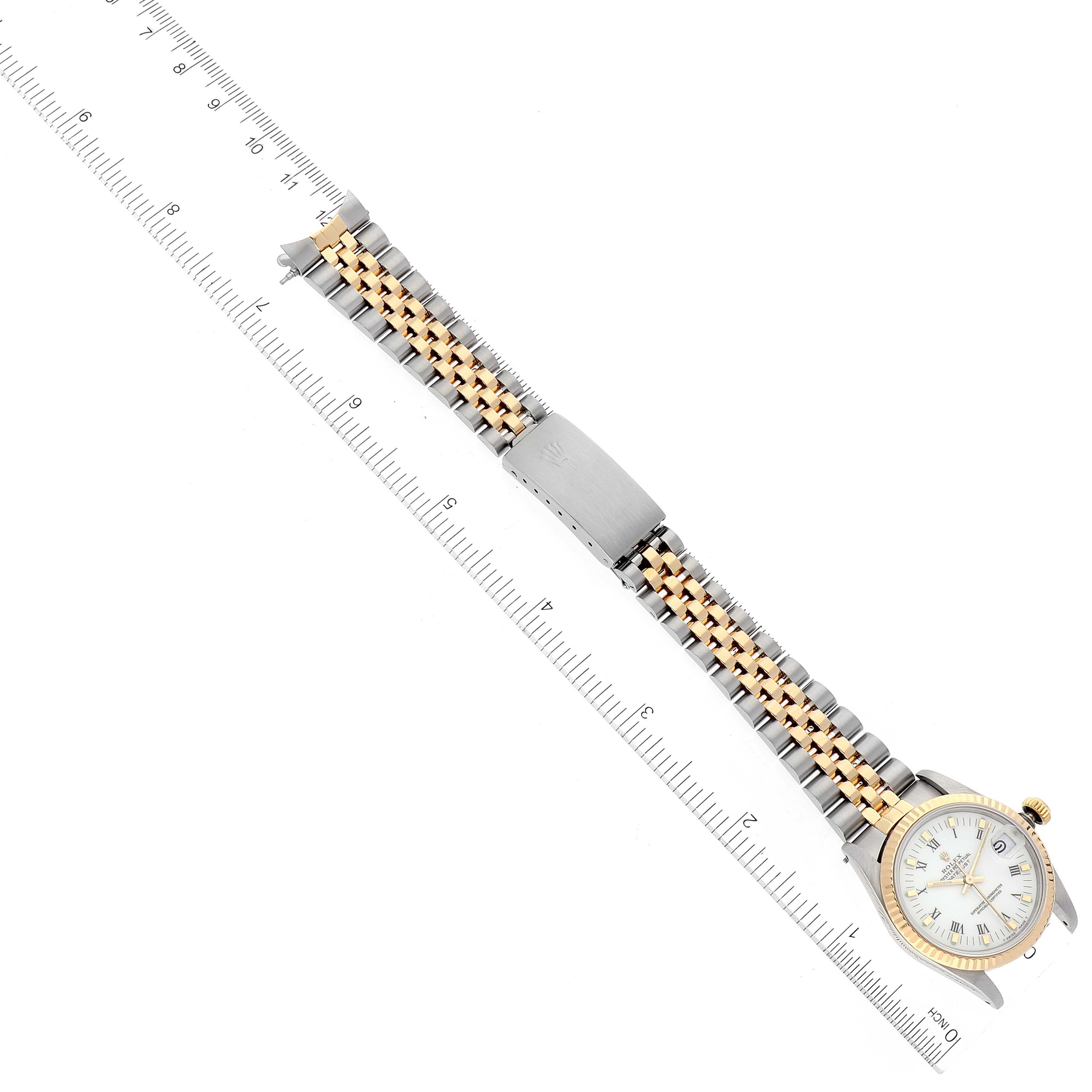 The image shows a laid-flat Rolex Mid-Size 68273 Women
s Steel and Gold (two tone) White Dial 68273 Women
s Steel and Gold (two tone) White Dial model watch with a two-tone bracelet and ruler indicating its dimensions.