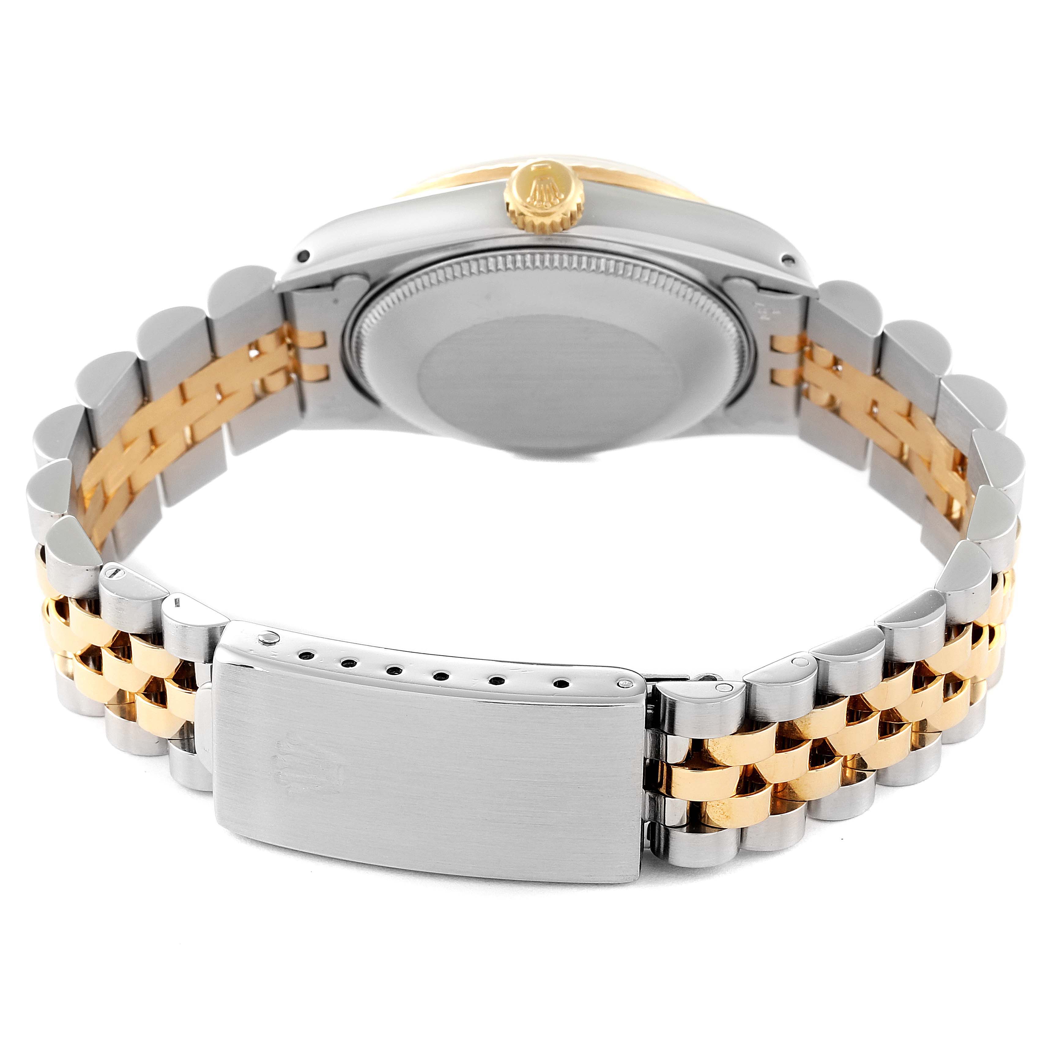 This image shows the back view of a Rolex Mid-Size 68273 Women
s Steel and Gold (two tone) White Dial 68273 Women
s Steel and Gold (two tone) White Dial model watch, highlighting its case back, Jubilee bracelet, and clasp.