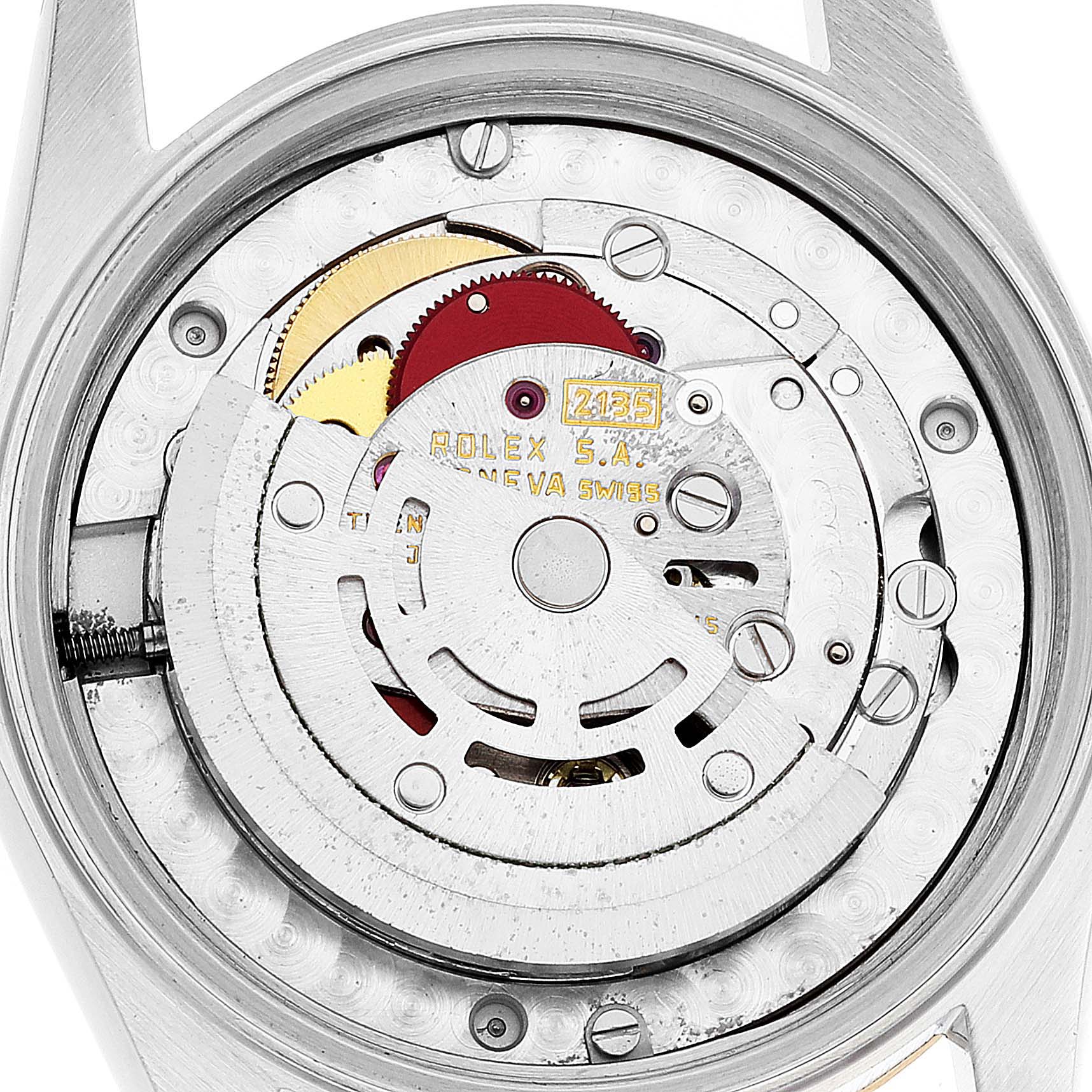 This image shows the internal mechanism and components of a Rolex Mid-Size 68273 Women
s Steel and Gold (two tone) White Dial 68273 Women
s Steel and Gold (two tone) White Dial watch, viewed from the back.