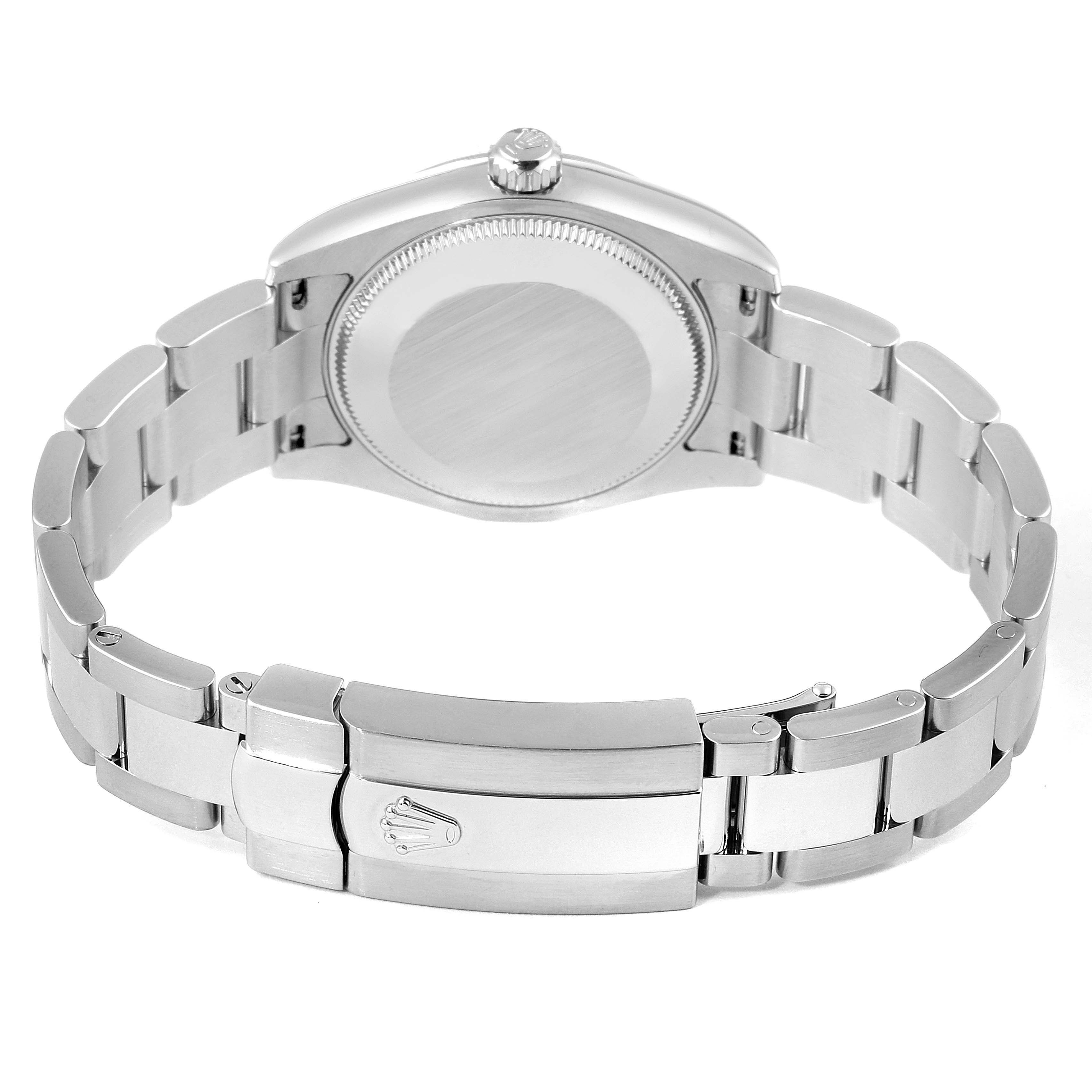 This image shows the back case and clasp of a Mid-Size Rolex watch.