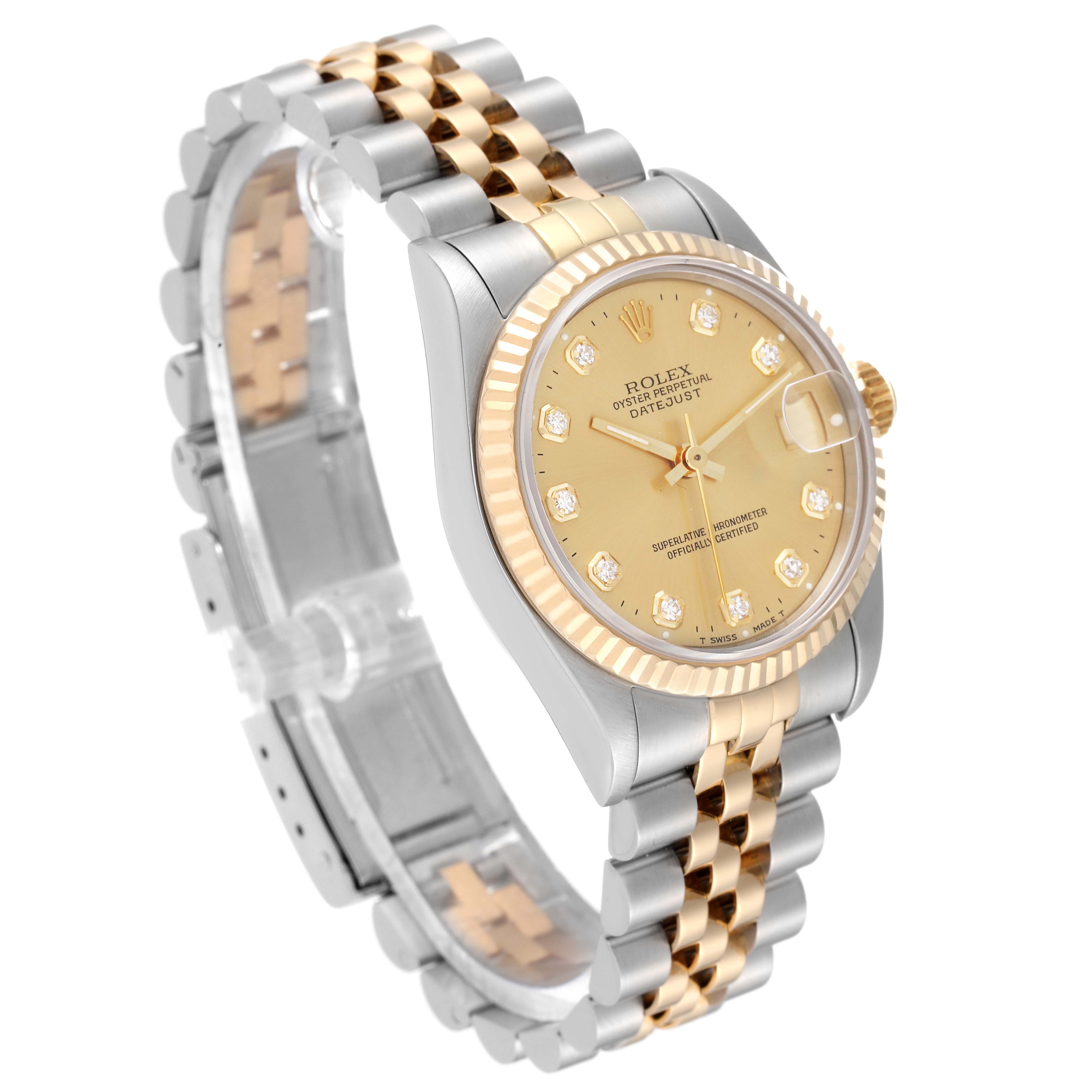 This image shows a Rolex Mid-Size 68273G Women
s Steel and Gold (two tone) Champagne Dial 68273G Women
s Steel and Gold (two tone) Champagne Dial Datejust watch featuring its gold dial, fluted bezel, and two-tone bracelet captured at a slight angle.