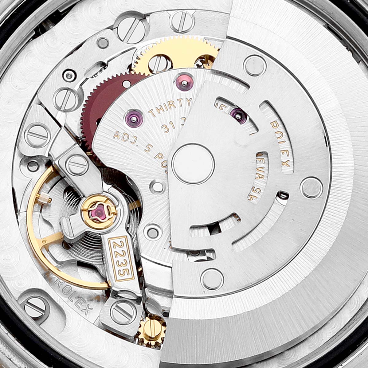 This close-up image shows the intricate internal movement parts of a Rolex Mid-Size 178343 Women
s Steel and Gold (two tone) Black Dial 178343 Women
s Steel and Gold (two tone) Black Dial watch.