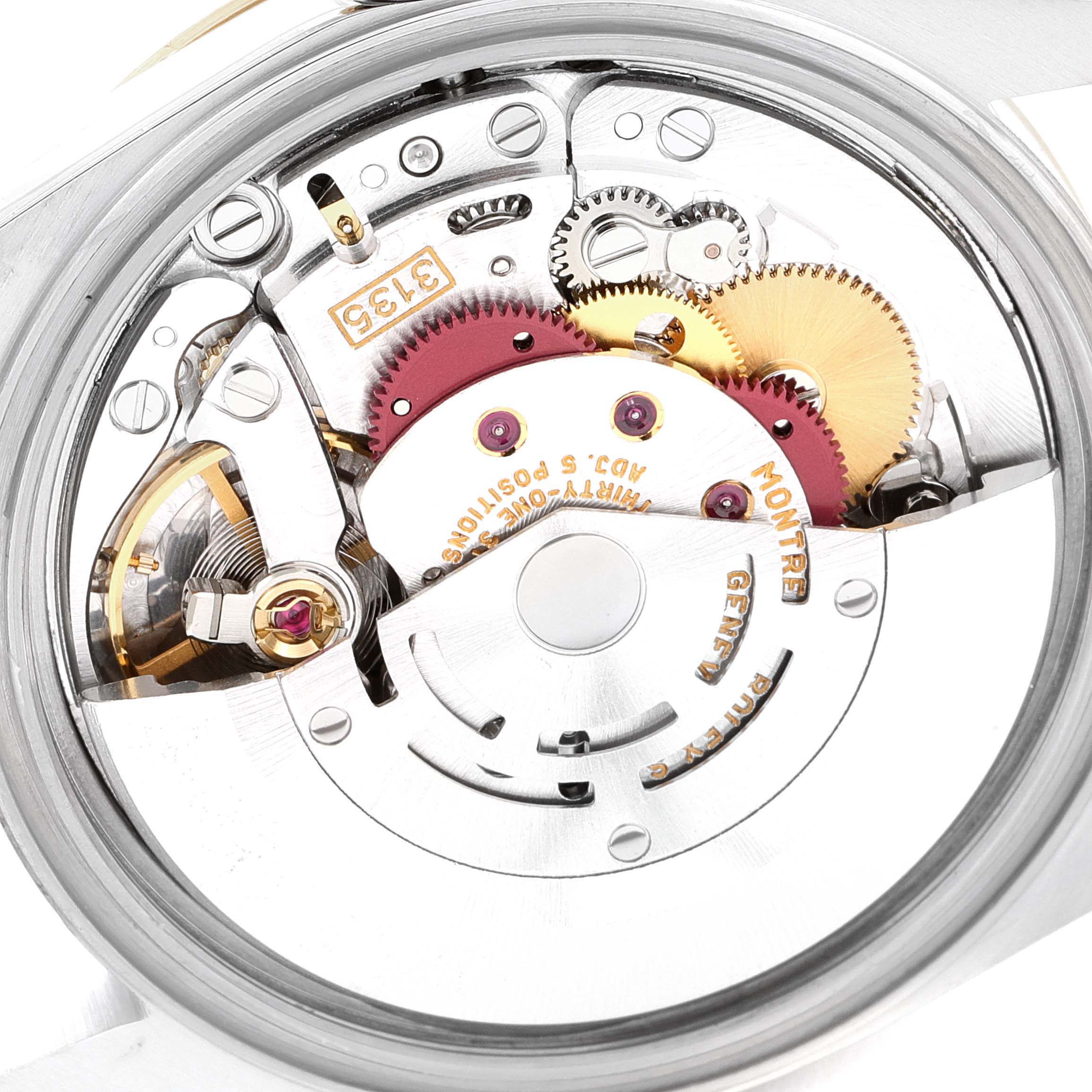 The image shows an interior view of the Rolex Datejust 16233 Men
s Steel and Gold (two tone) Beige Dial 16233 Men
s Steel and Gold (two tone) Beige Dial watch movement and gears, highlighting its intricate mechanisms.