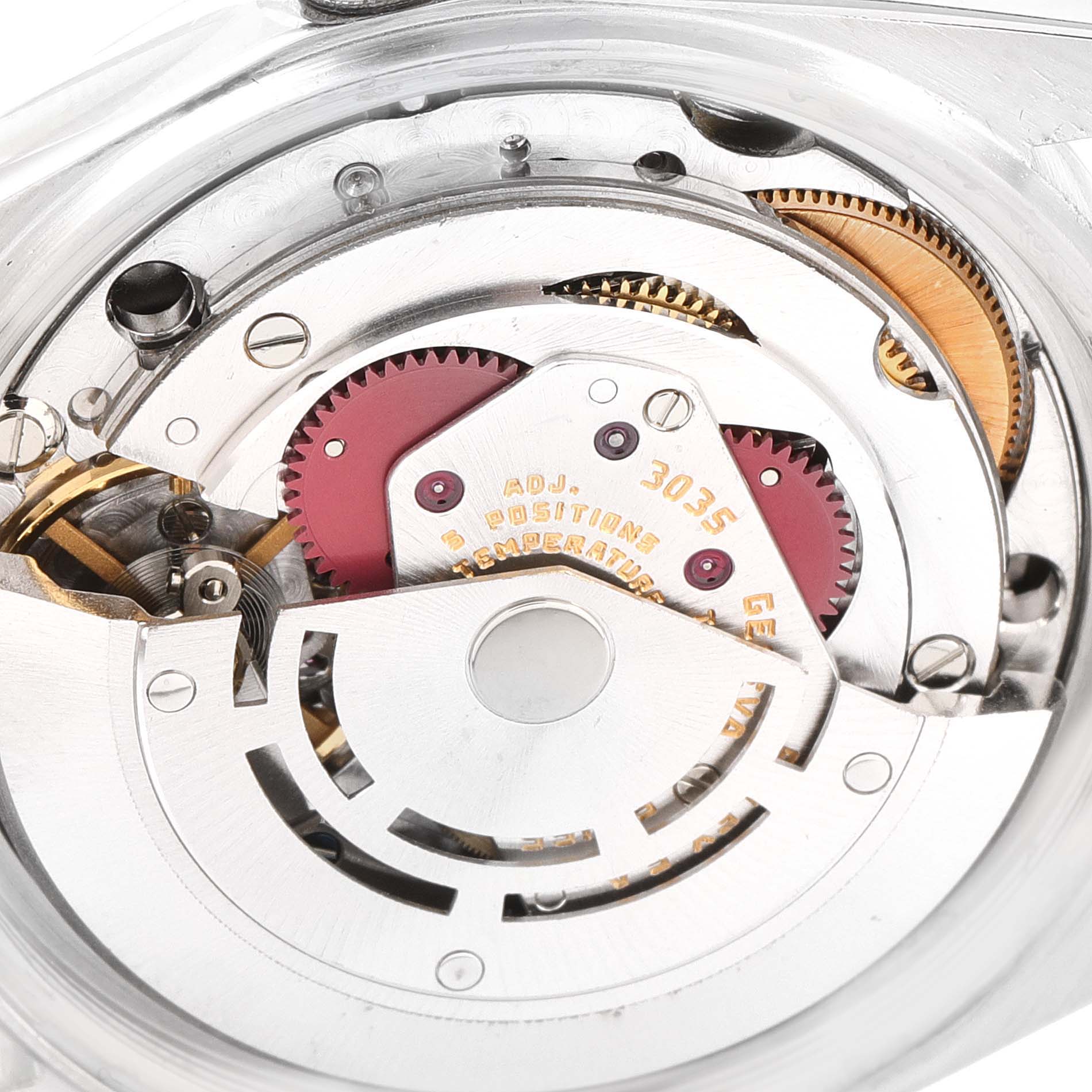 The image shows a close-up of the movement mechanism of a Vintage Collection model by Rolex.