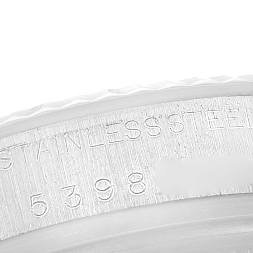 This image shows a close-up of the case back and engraved serial number of a Rolex Vintage Collection 16014 Men's Stainless Steel White Dial 16014 Men's Stainless Steel White Dial model watch.