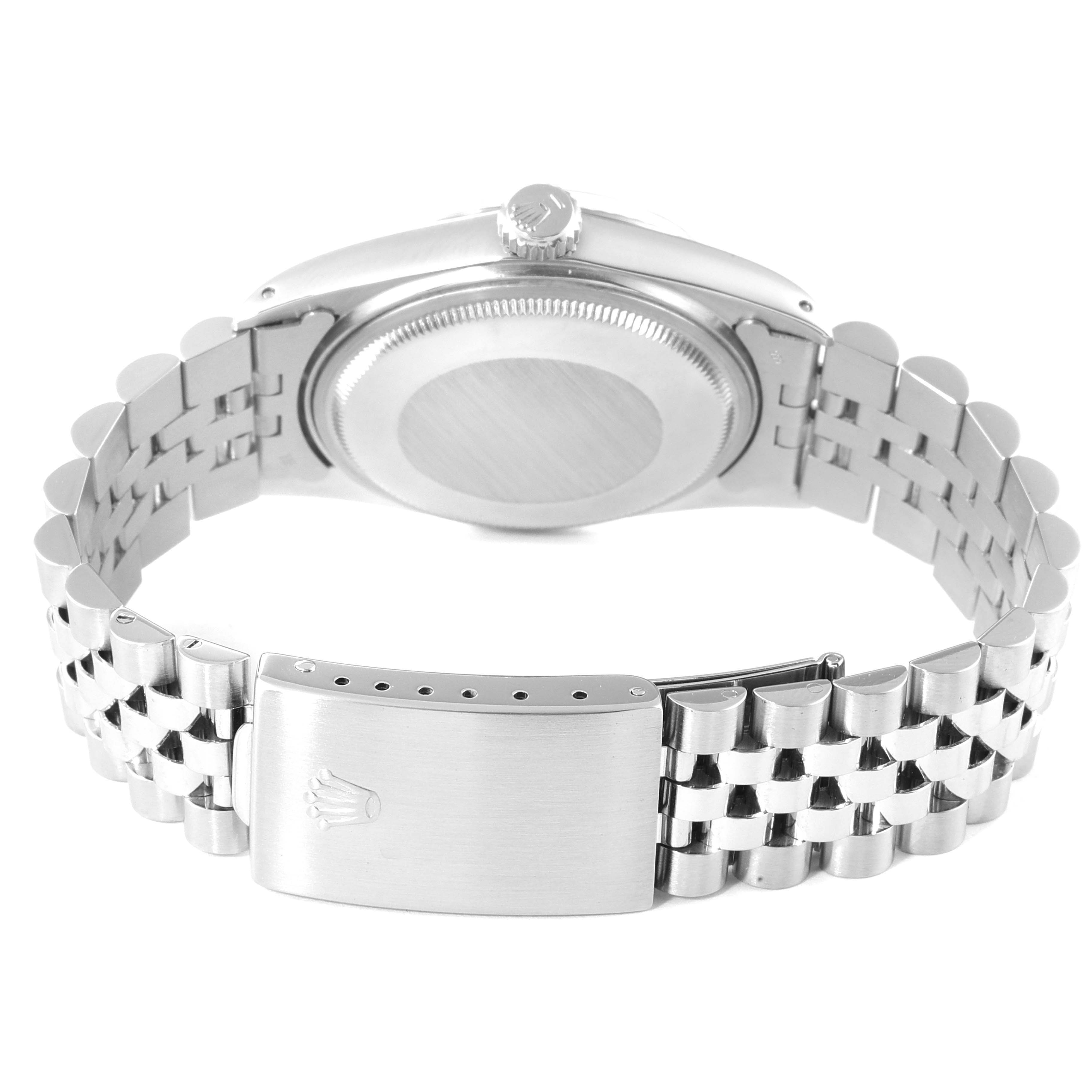 This image shows the back case and metal bracelet, including the clasp, of the Vintage Collection model by Rolex.