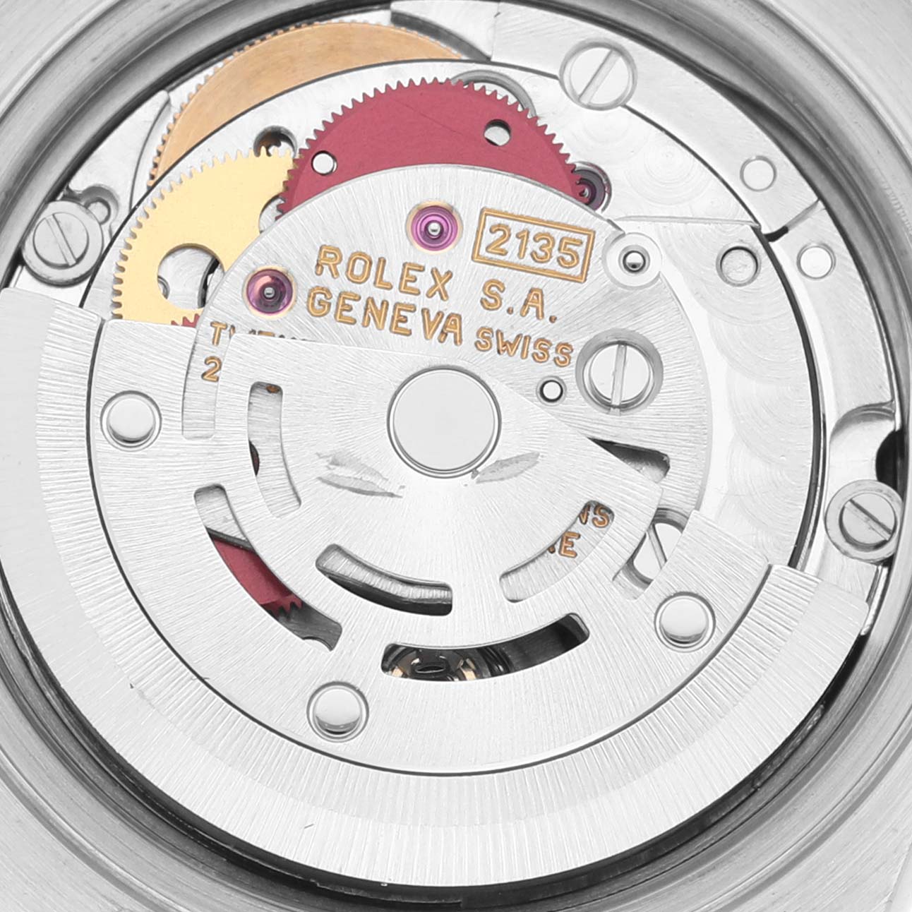 This image shows the inner mechanical movement of the Rolex Datejust 69173 Women's Steel and Gold (two tone) Black Dial 69173 Women's Steel and Gold (two tone) Black Dial watch, featuring gears and the rotor.