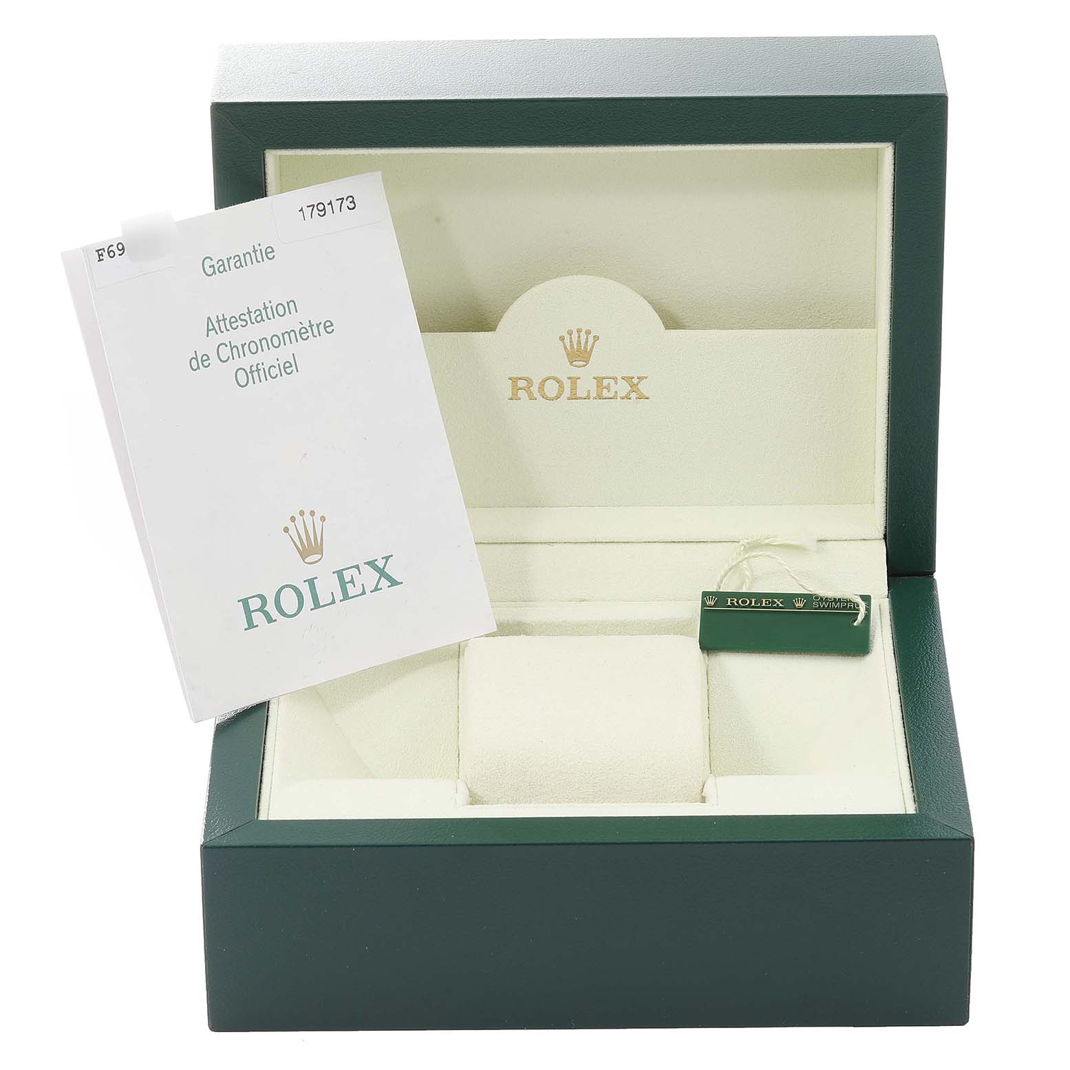 This image shows an empty Rolex Datejust 179173 Women's Steel and Gold (two tone) Champagne Dial 179173 Women's Steel and Gold (two tone) Champagne Dial watch box with documents and a tag, viewed from a front angle.