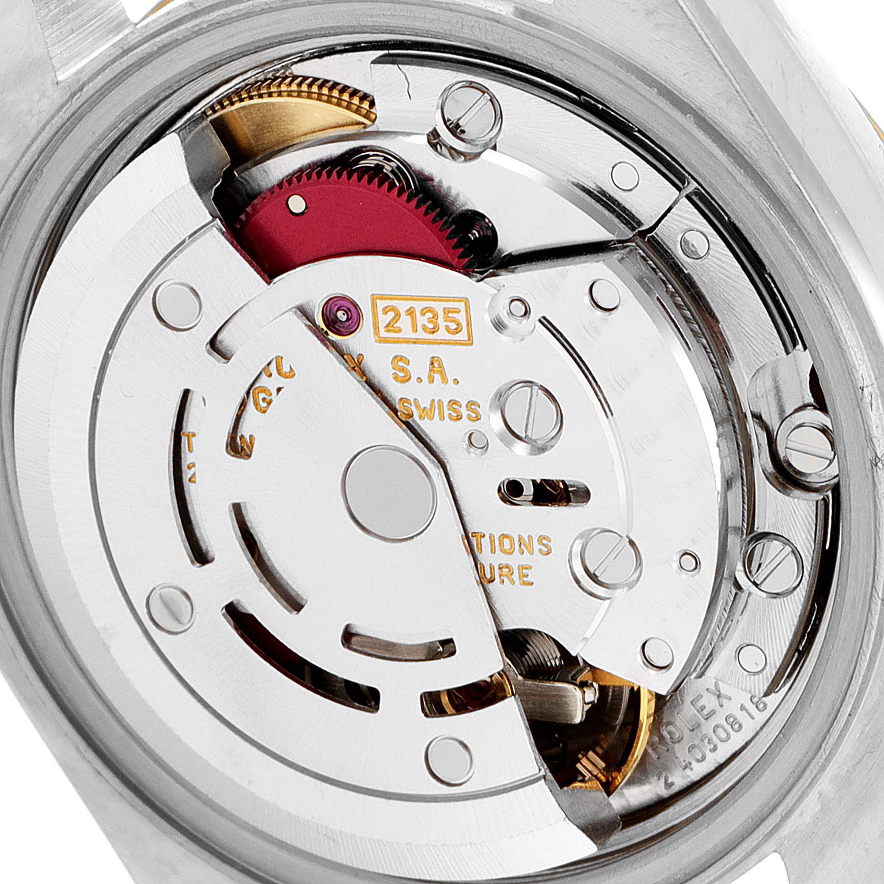 This image shows the inner mechanical movement of a Rolex Datejust 69173 Women's Steel and Gold (two tone) Champagne Dial 69173 Women's Steel and Gold (two tone) Champagne Dial watch, specifically the rotor and other components.