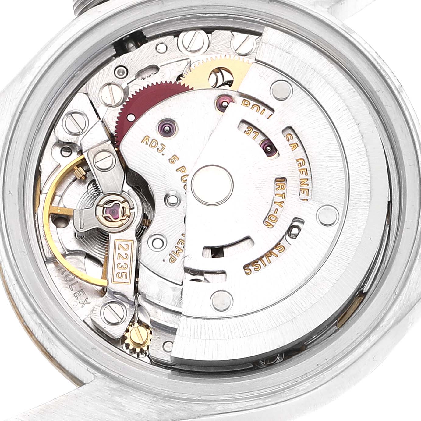 The image shows the intricate internal mechanism of a Rolex Datejust 79173 Women's Steel and Gold (two tone) Mother of Pearl Dial 79173 Women's Steel and Gold (two tone) Mother of Pearl Dial watch from a close-up angle.