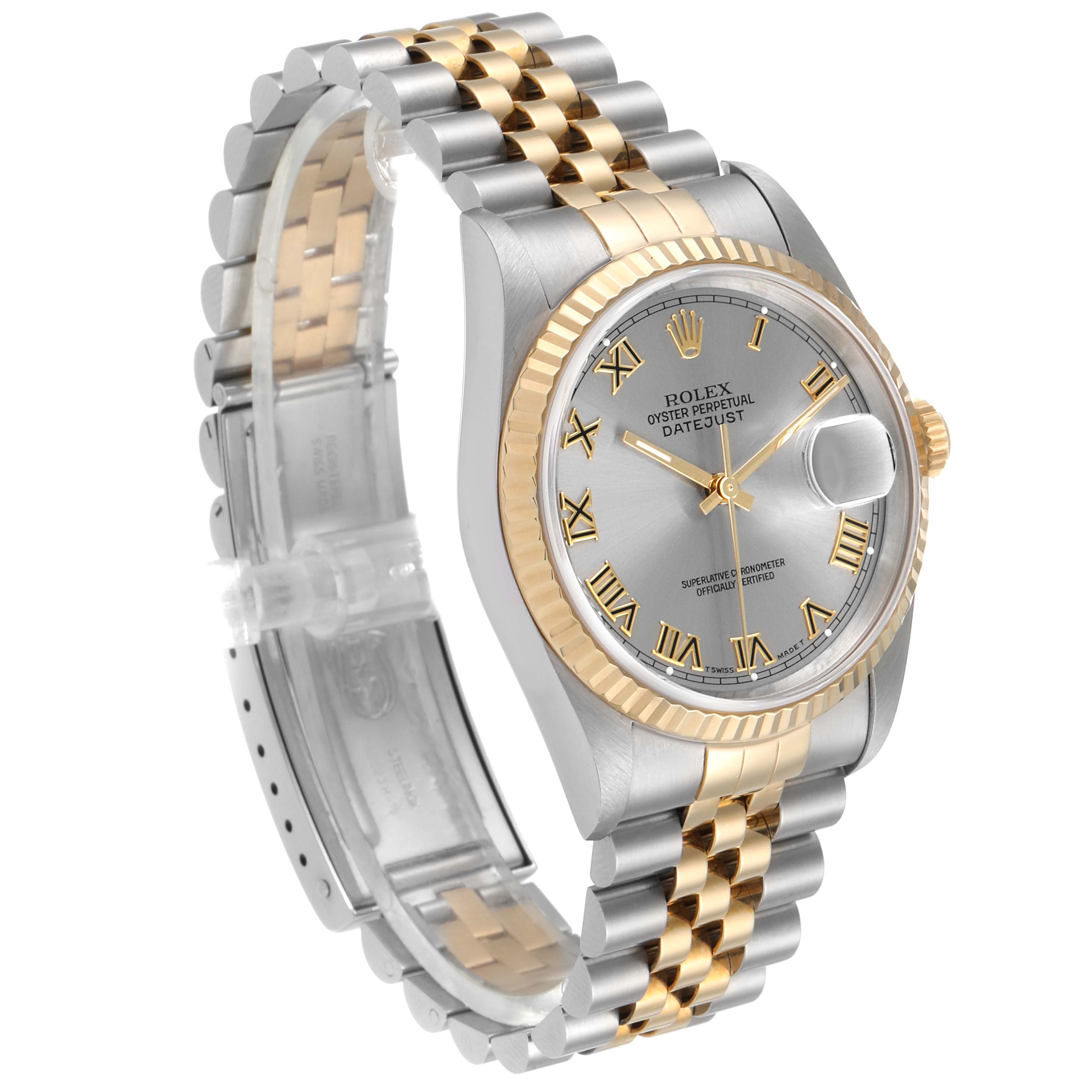 The image shows a Rolex Datejust 16233 Men
s Steel and Gold (two tone) Grey Dial 16233 Men
s Steel and Gold (two tone) Grey Dial watch at a three-quarter angle, highlighting its two-tone bracelet, fluted bezel, and dial with Roman numerals.