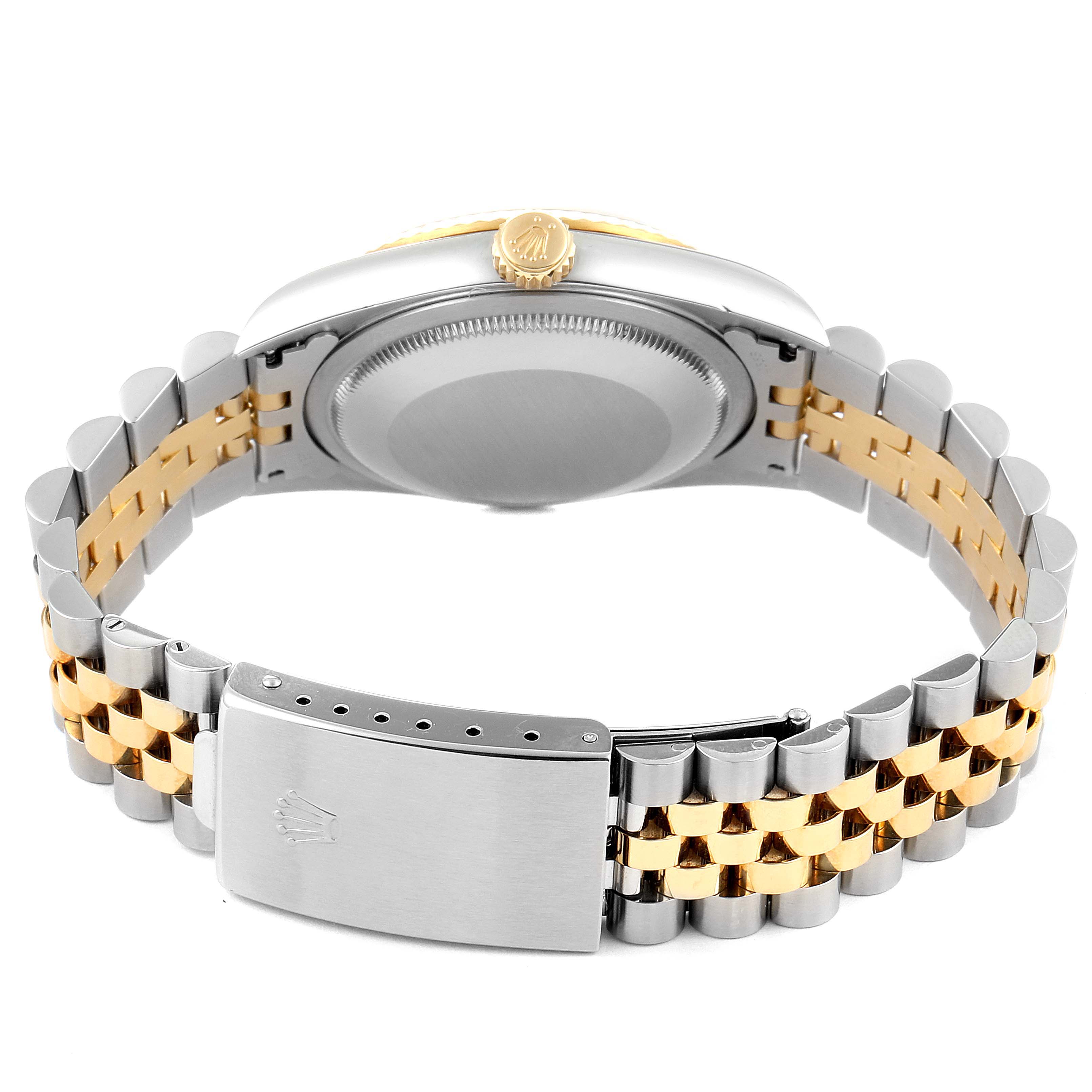 The image shows the back view of the Rolex Datejust 16233 Men
s Steel and Gold (two tone) Grey Dial 16233 Men
s Steel and Gold (two tone) Grey Dial watch, highlighting its clasp, bracelet, and case back.