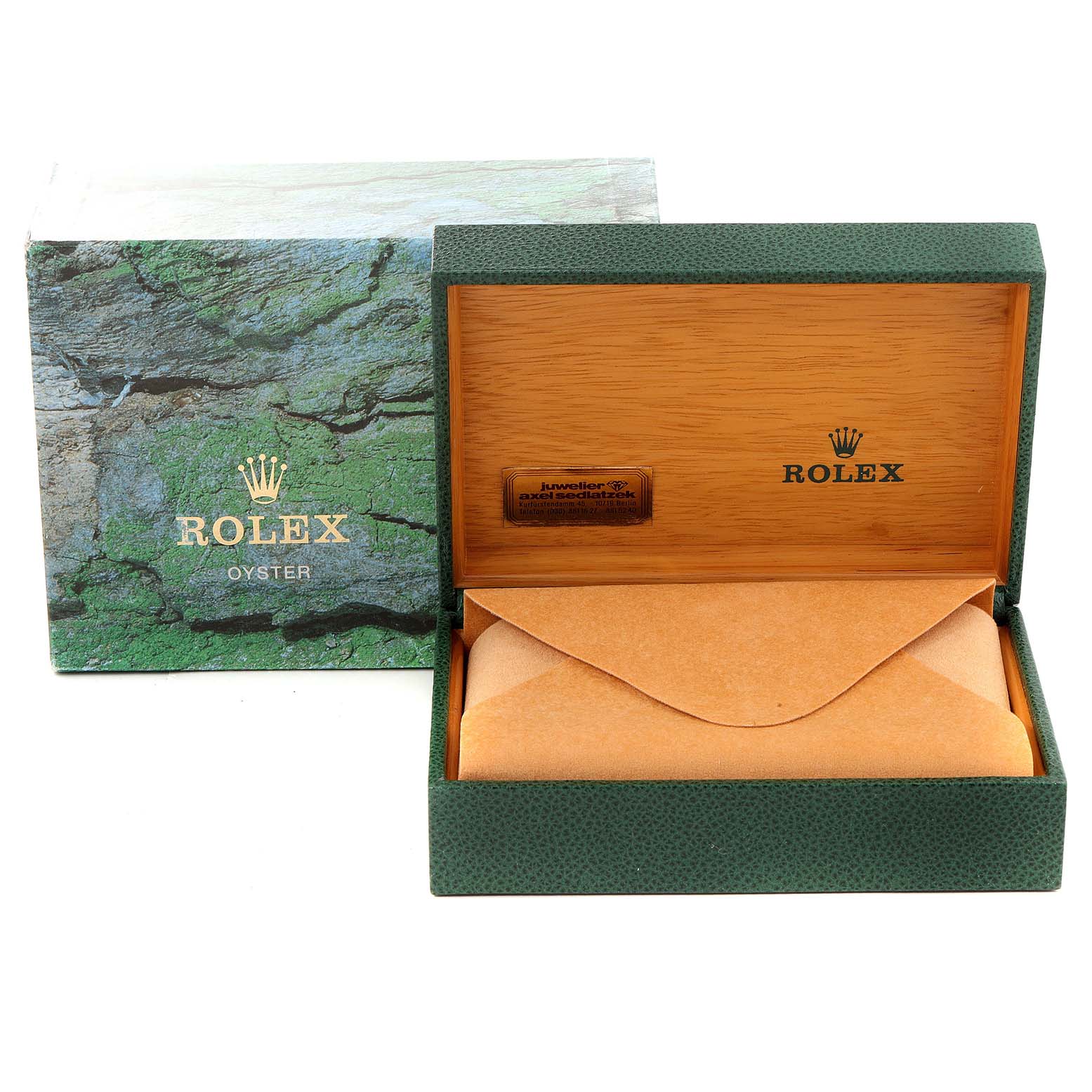 The image shows the closed box and packaging of a Rolex Datejust 16233 Men's Steel and Gold (two tone) White Dial 16233 Men's Steel and Gold (two tone) White Dial, featuring green and wooden accents.