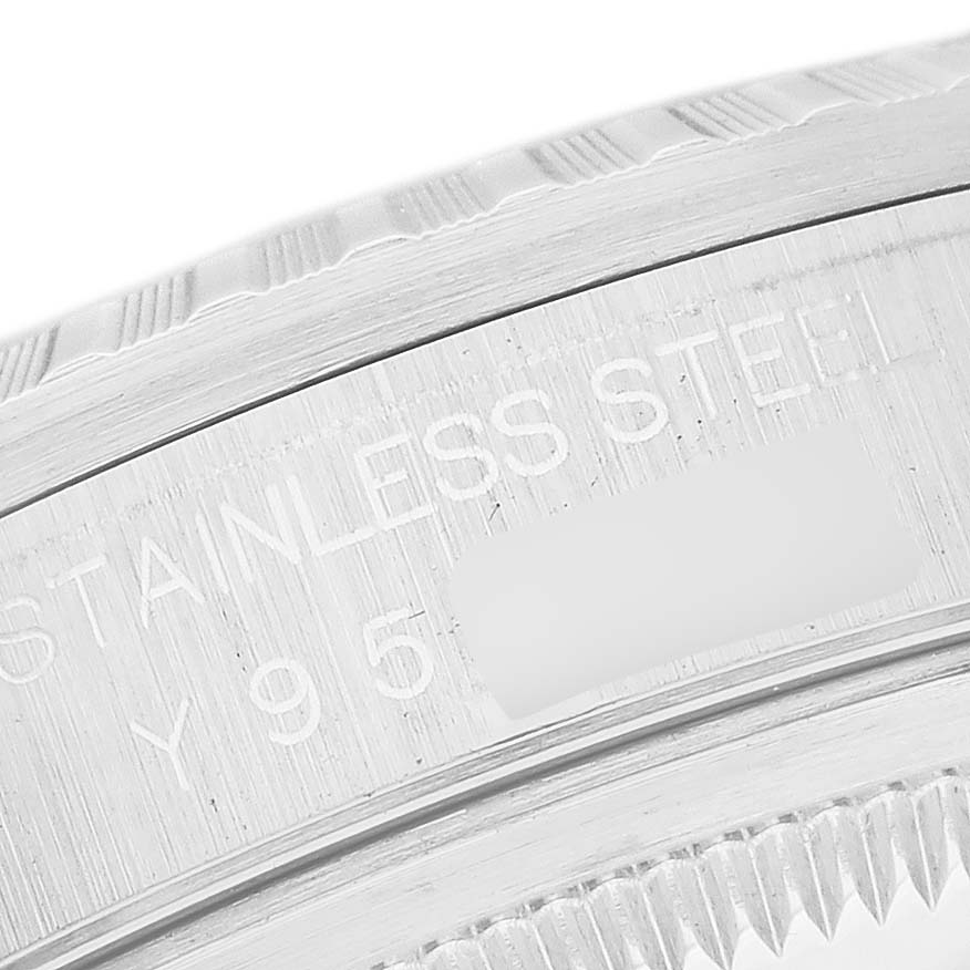 The image shows a close-up of the engraved stainless steel case-back of a Rolex Datejust 16220 Men's Stainless Steel White Dial 16220 Men's Stainless Steel White Dial watch.