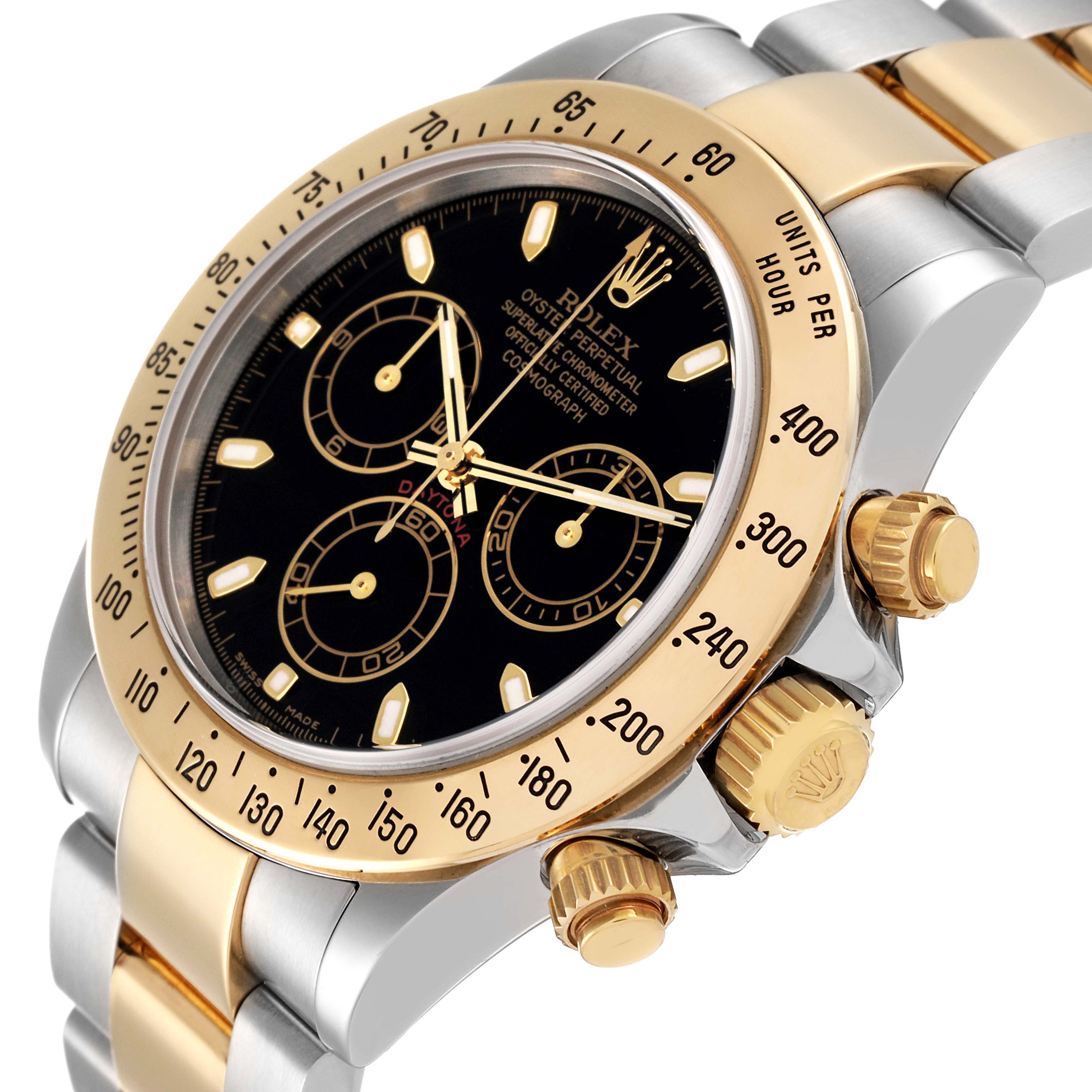 The image shows a close-up angle of a Rolex Daytona 116523 Men's Steel and Gold (two tone) Black Dial 116523 Men's Steel and Gold (two tone) Black Dial watch, highlighting its dial, bezel, and crown.