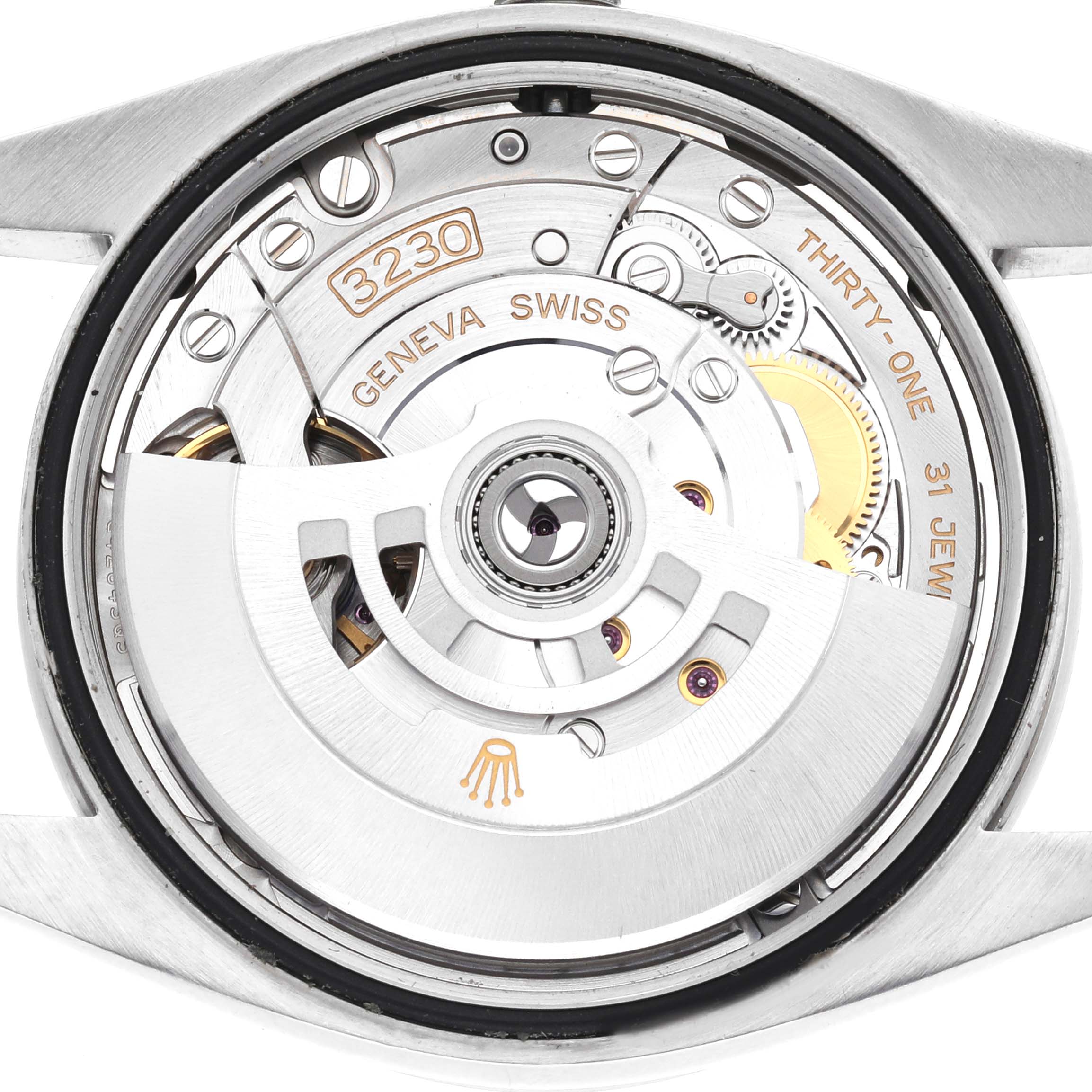 The image shows the movement from the back of a Rolex Explorer 124270 Men's Stainless Steel Black Dial, highlighting the rotor and intricate mechanisms.