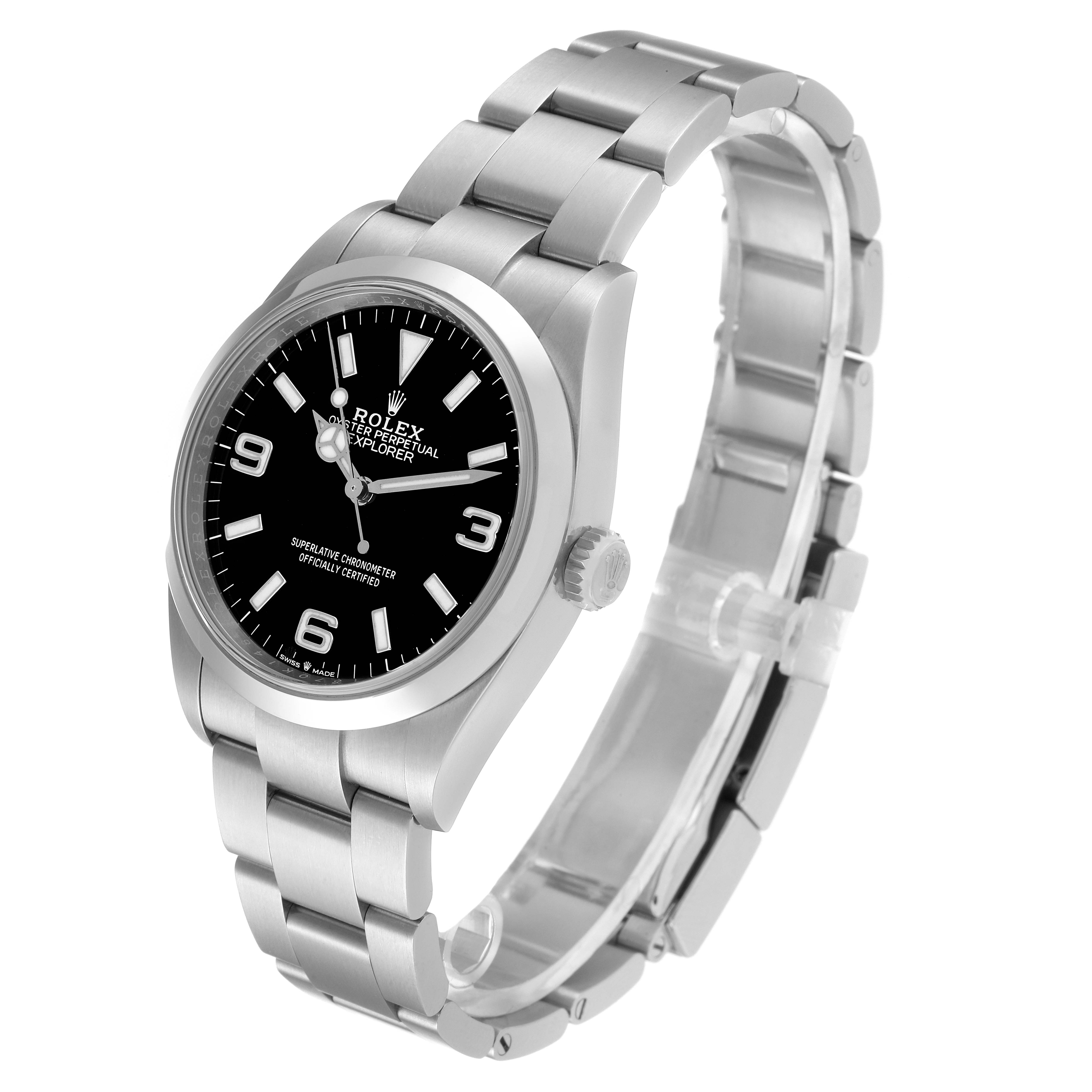 The image shows a side angle of a Rolex Explorer 124270 Men
s Stainless Steel Black Dial 124270 Men
s Stainless Steel Black Dial watch, displaying the face, crown, and metal bracelet.