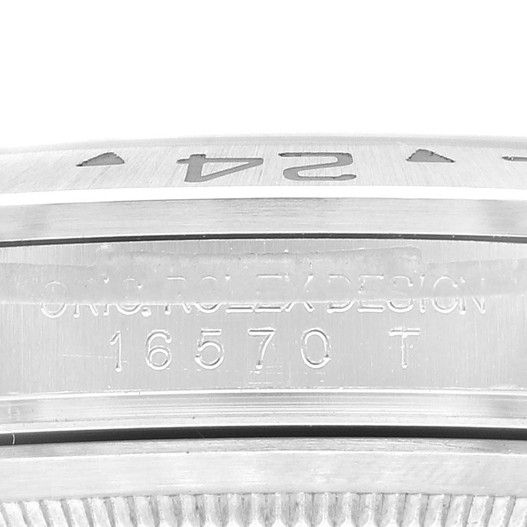 This close-up image shows the case back of the Rolex Explorer 16570T Men
s Stainless Steel Black Dial 16570T Men
s Stainless Steel Black Dial model, highlighting reference and engraving details.