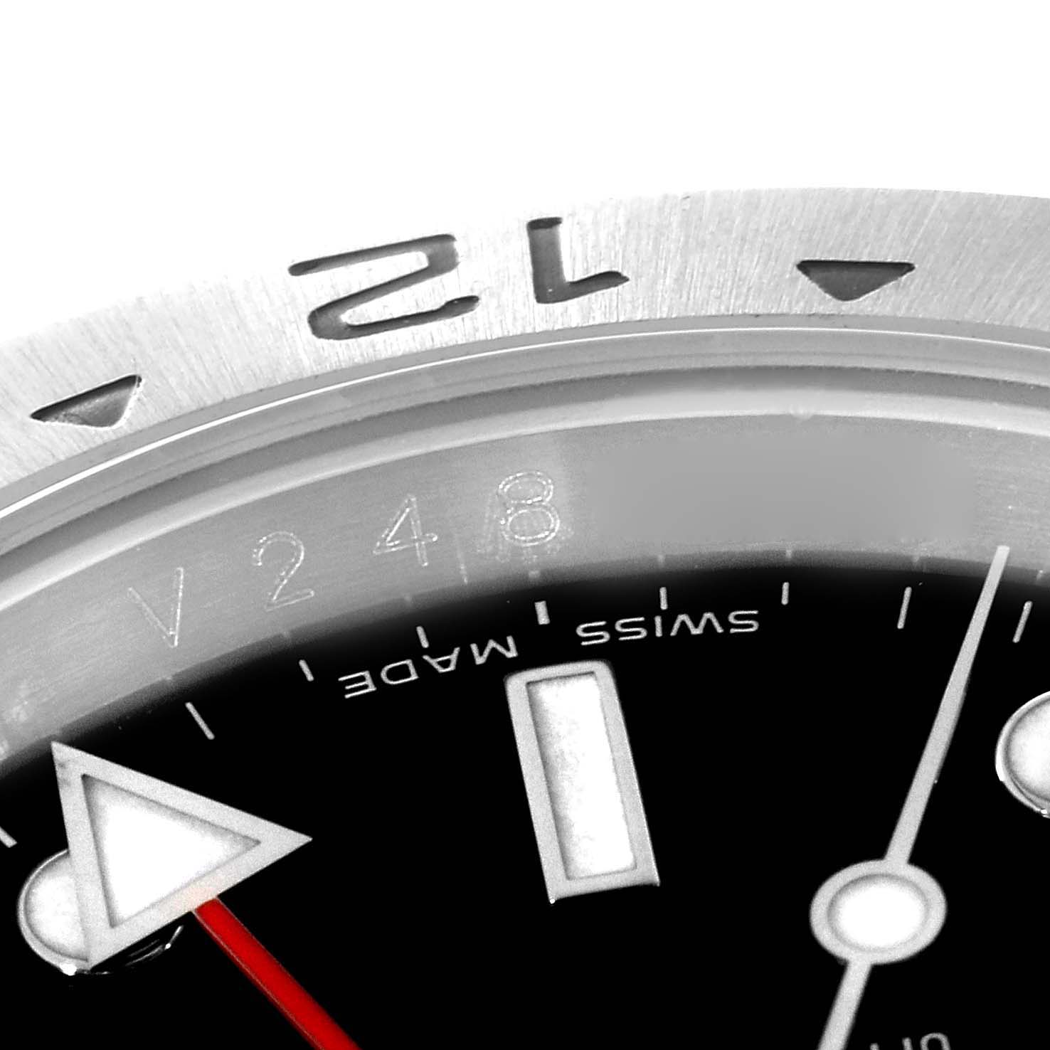 The image shows a close-up of the dial, hands, and part of the bezel of a Rolex Explorer 16570T Men
s Stainless Steel Black Dial 16570T Men
s Stainless Steel Black Dial watch.