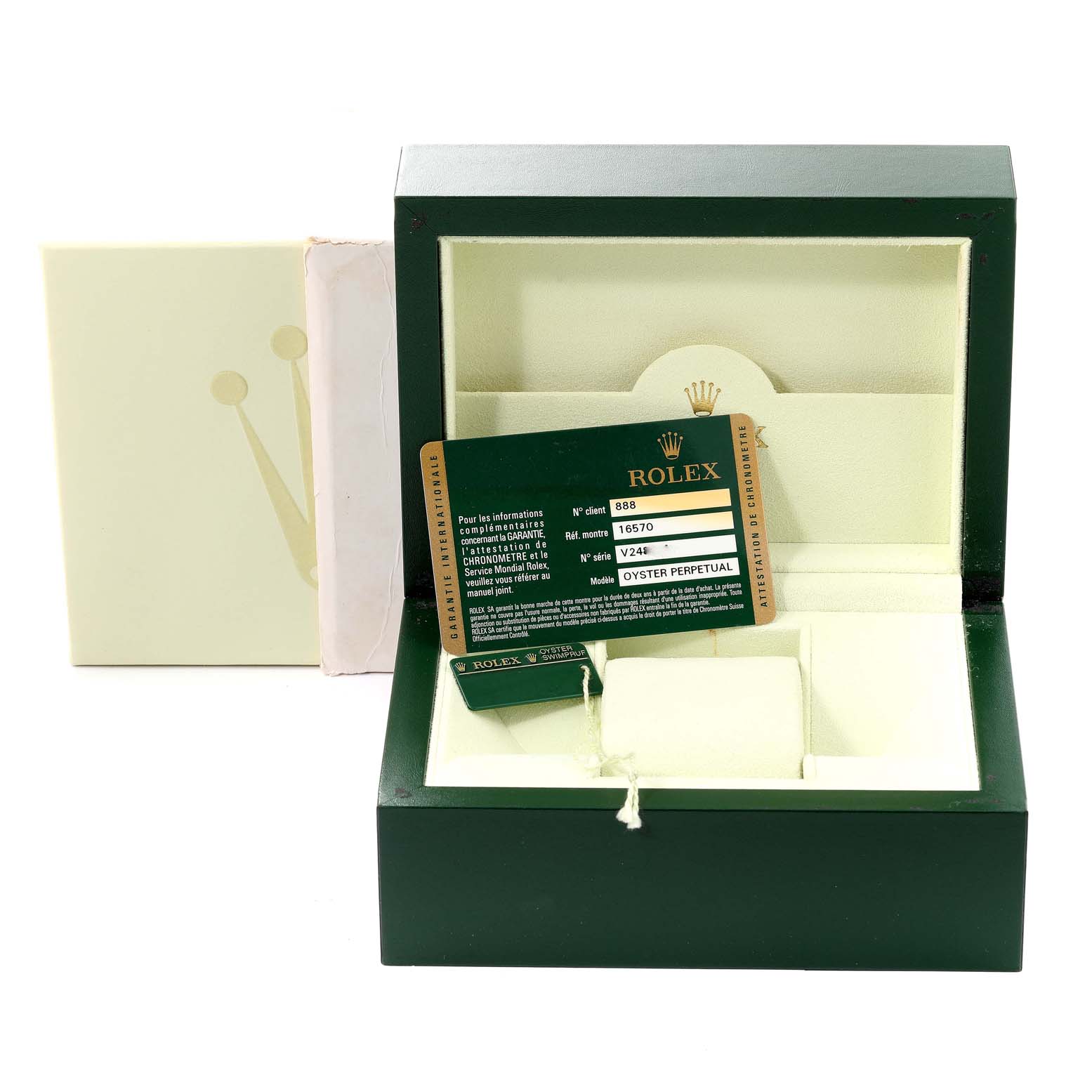 The image shows a Rolex Explorer 16570T Men
s Stainless Steel Black Dial 16570T Men
s Stainless Steel Black Dial watch box and accessories, including a warranty card and a cushion, from a frontal angle.