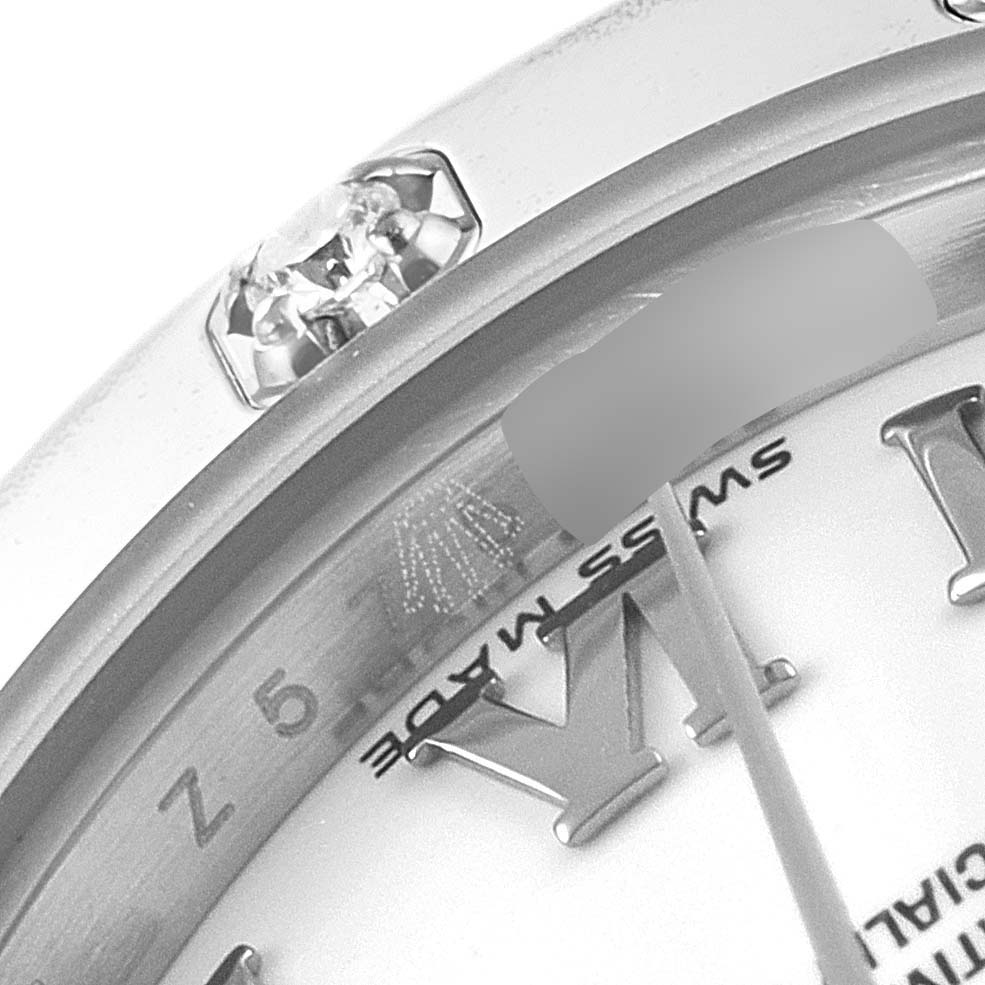 This close-up image shows a partial view of the dial and bezel of the Rolex Pearlmaster 80319 Women's White Gold White Dial 80319 Women's White Gold White Dial watch, featuring a diamond-set bezel.
