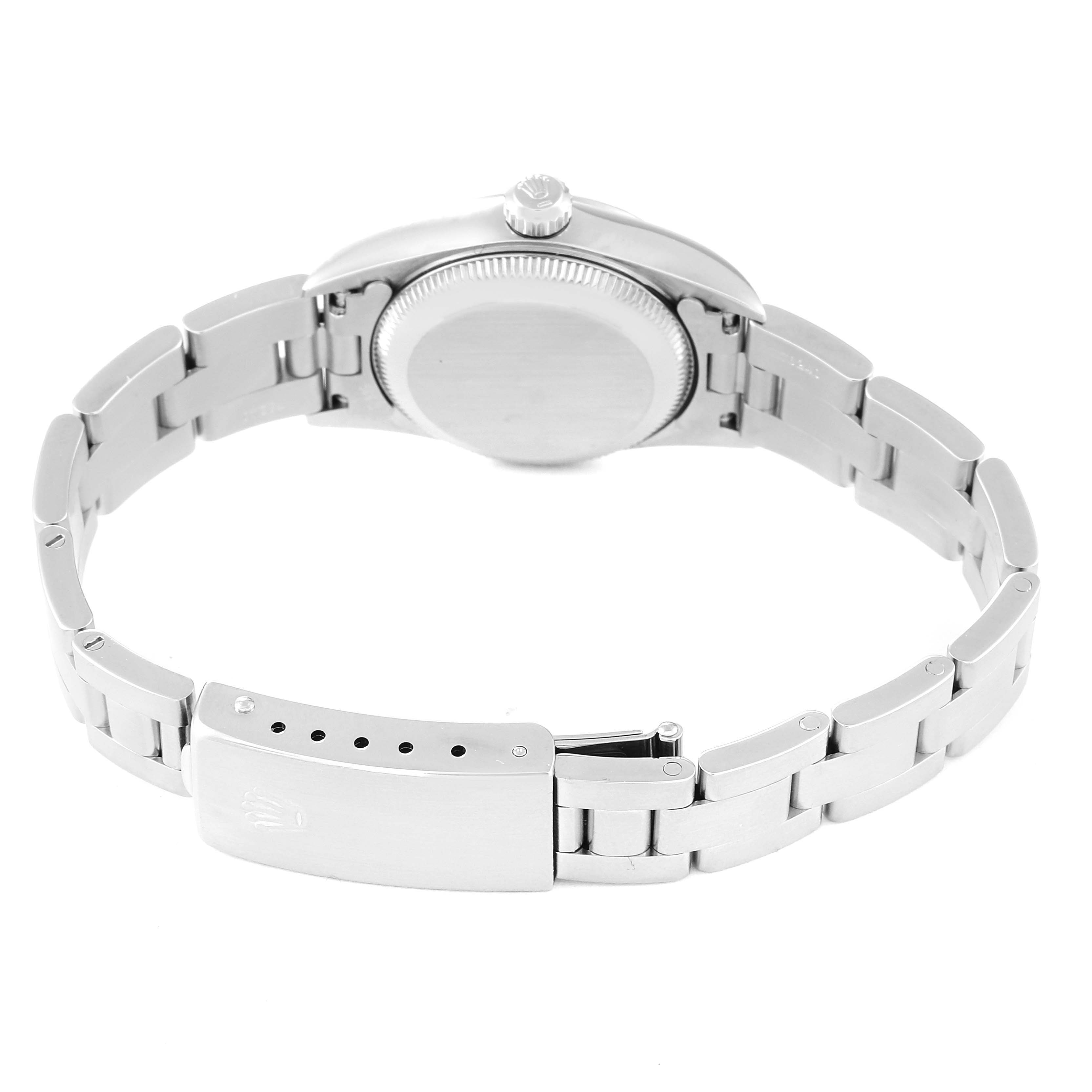 This image shows the back view of a Rolex Oyster Perpetual 76030 Women's Stainless Steel Orange Dial 76030 Women's Stainless Steel Orange Dial watch, highlighting the case back and the bracelet with the clasp.