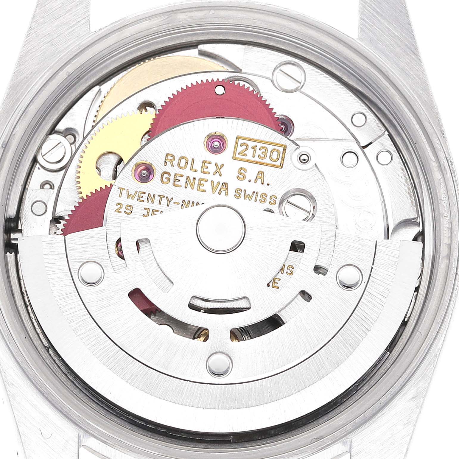 This image shows a close-up of the movement mechanism inside a Rolex Oyster Perpetual 67194 Women's Stainless Steel Orange Dial 67194 Women's Stainless Steel Orange Dial watch.